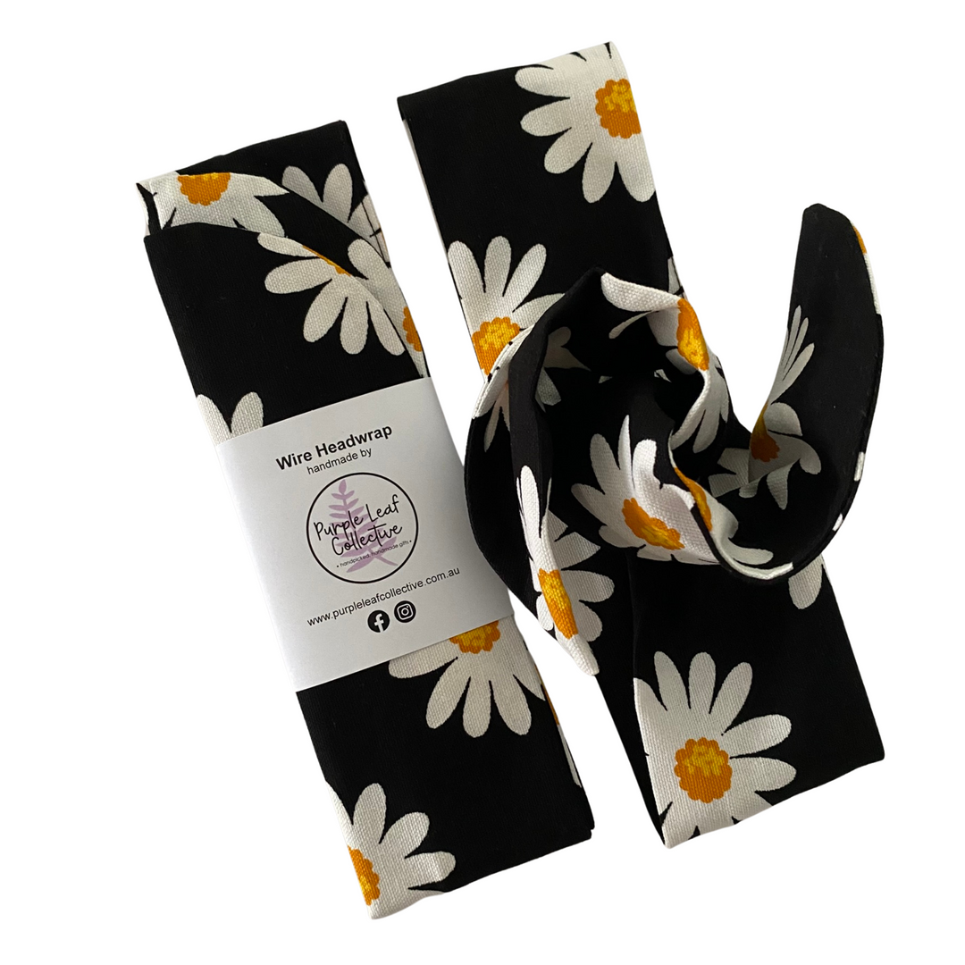 Handmade wire headwrap, headband with big daisy white flowers set on black fabric. Stylish, adjustable, and perfect for all-day wear or hair loss coverage.