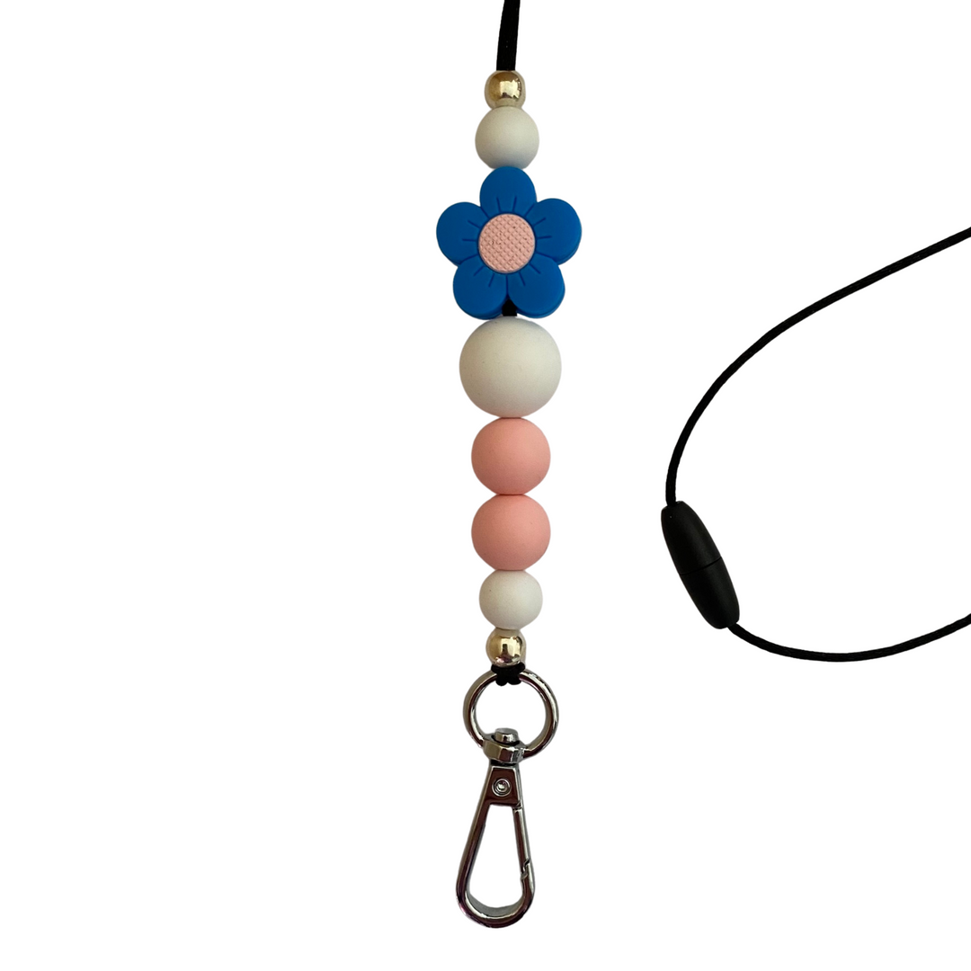 A 60cm lanyard fitted with a safety break away clasp featuring a blue flower silicone bead and other coloured round silicone beads.