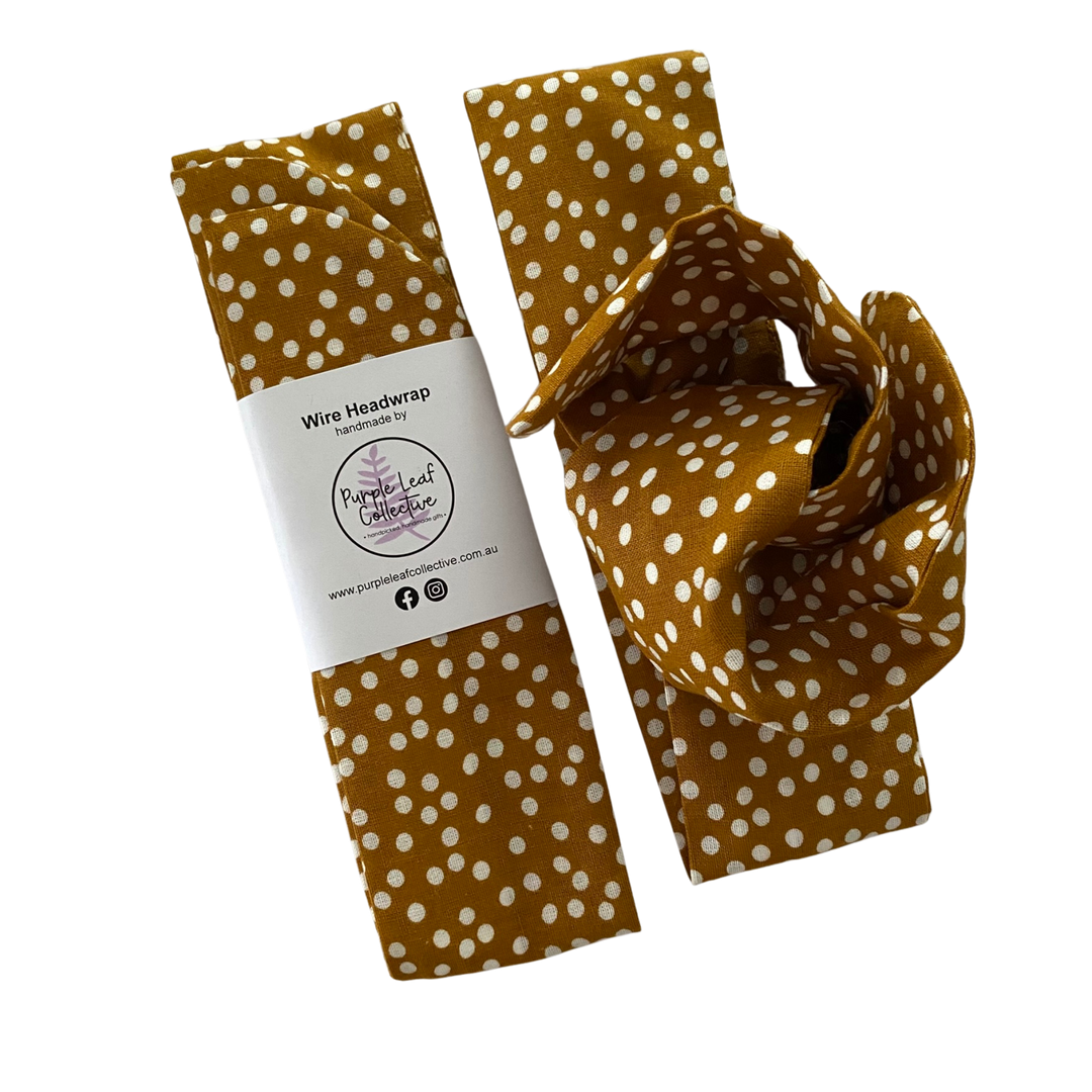 Handmade wire headwrap, headband with small white spots set on mustard colour fabric. Stylish, adjustable, and perfect for all-day wear or hair loss coverage.