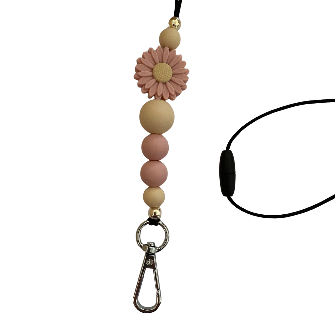 A 60cm lanyard fitted with a safety break away clasp and a Daisy Dusky Rose silicone bead and other coloured round silicone beads.