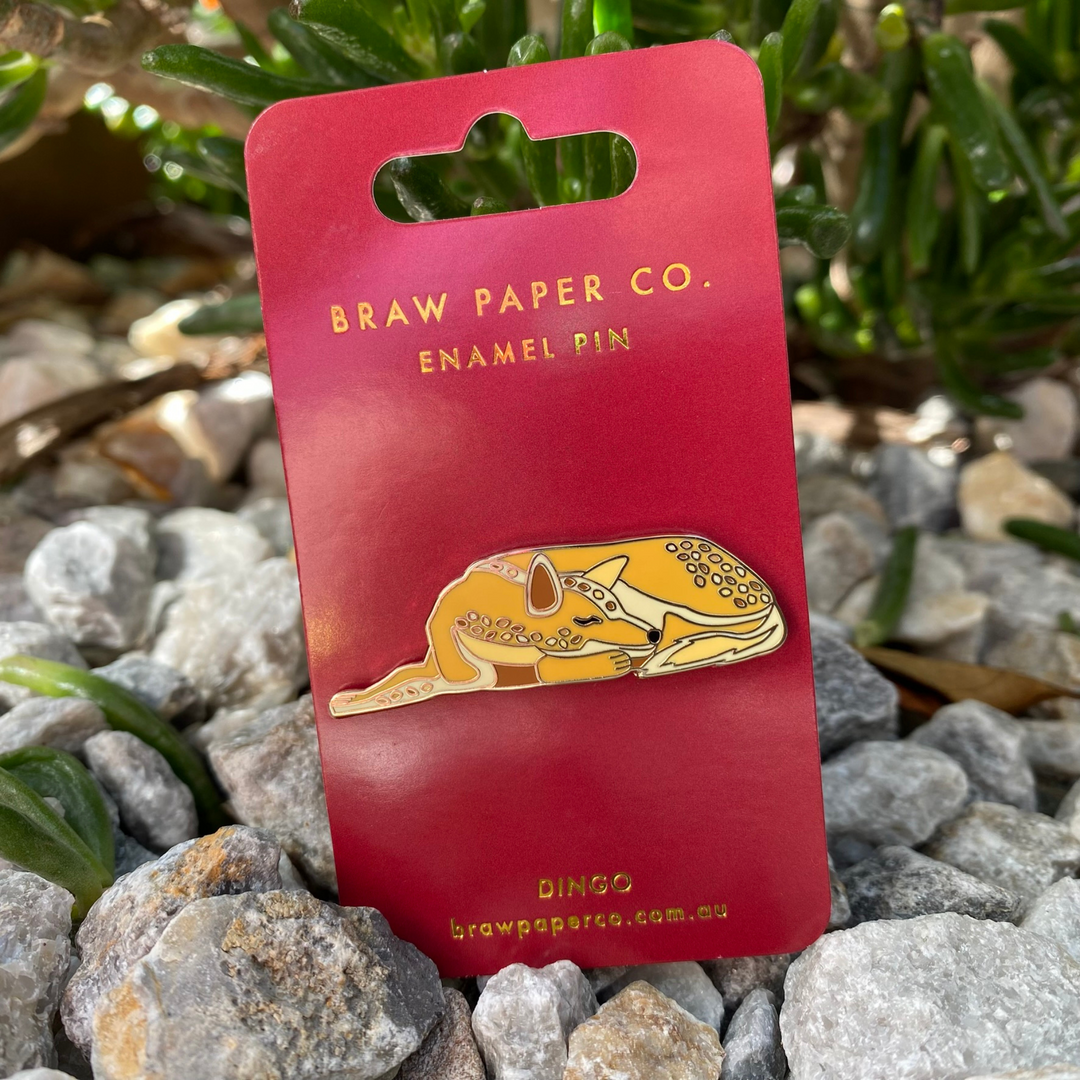 Our Dingo Enamel Pin featuring a warm, earthy colour palette inspired by the Australian Outback.