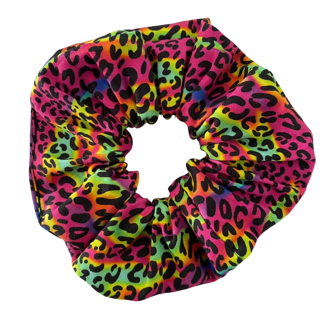 Fluro Leopard Scrunchie, handmade from soft cotton woven fabric, this scrunchie features a bold and playful fluro leopard print.