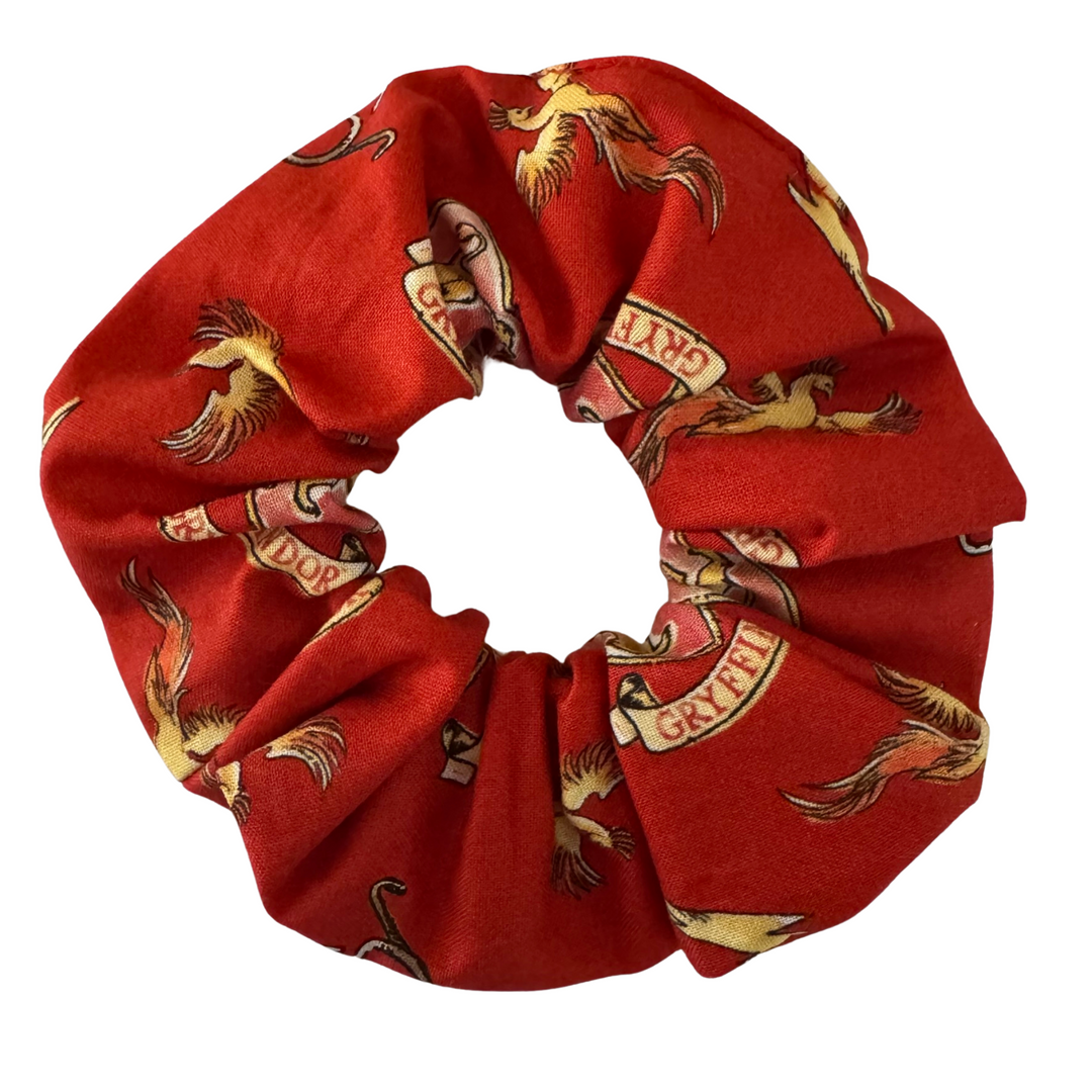 Gryffindor House Scrunchie featuring the iconic red and gold tones of Gryffindor, it’s perfect for showing off your house pride.