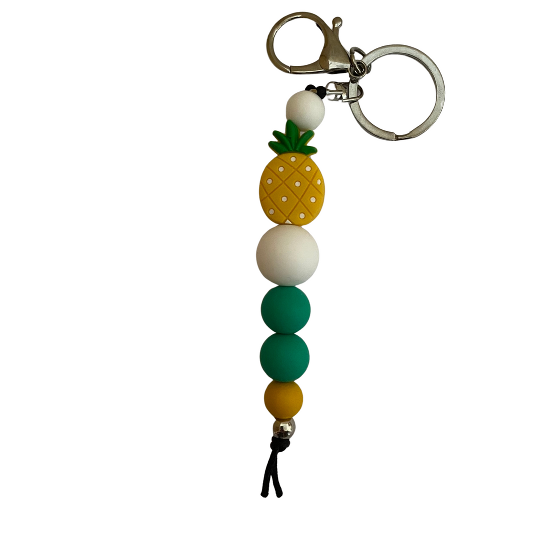 A 18cm keyring featuring a pineapple silicone bead and other round silicone beads.