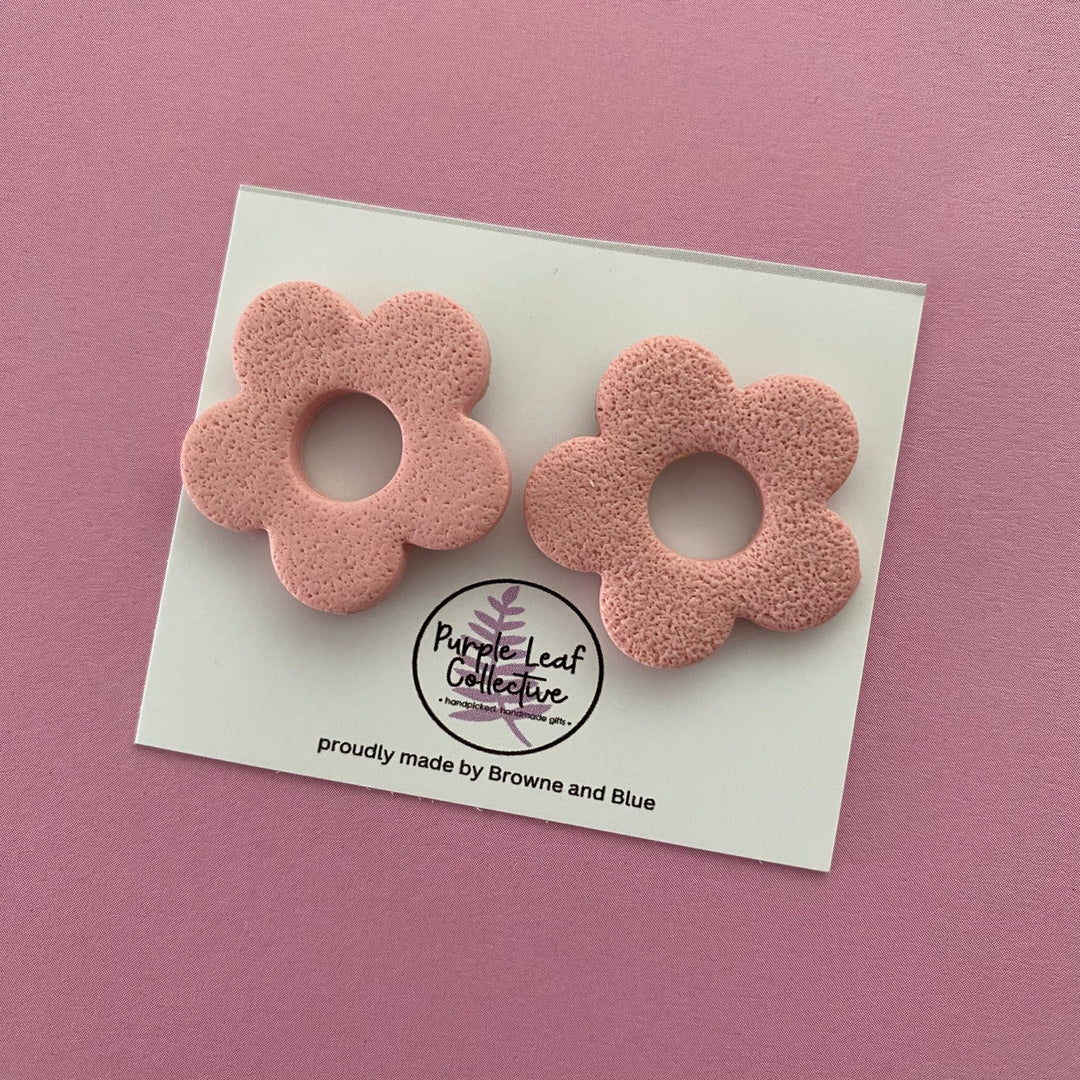 Drop stud earrings with five antique pink polymer clay flower petals, set on surgical steel posts for comfort and durability.
