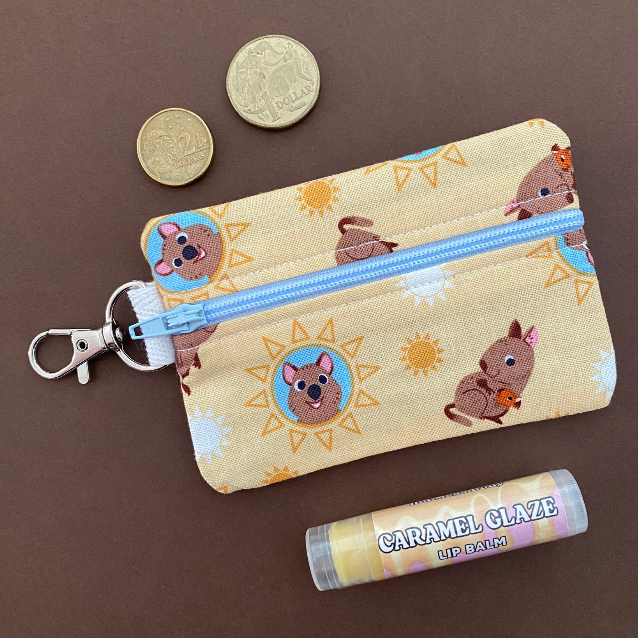 A clip mini coin purse with images of playful Quokkas.