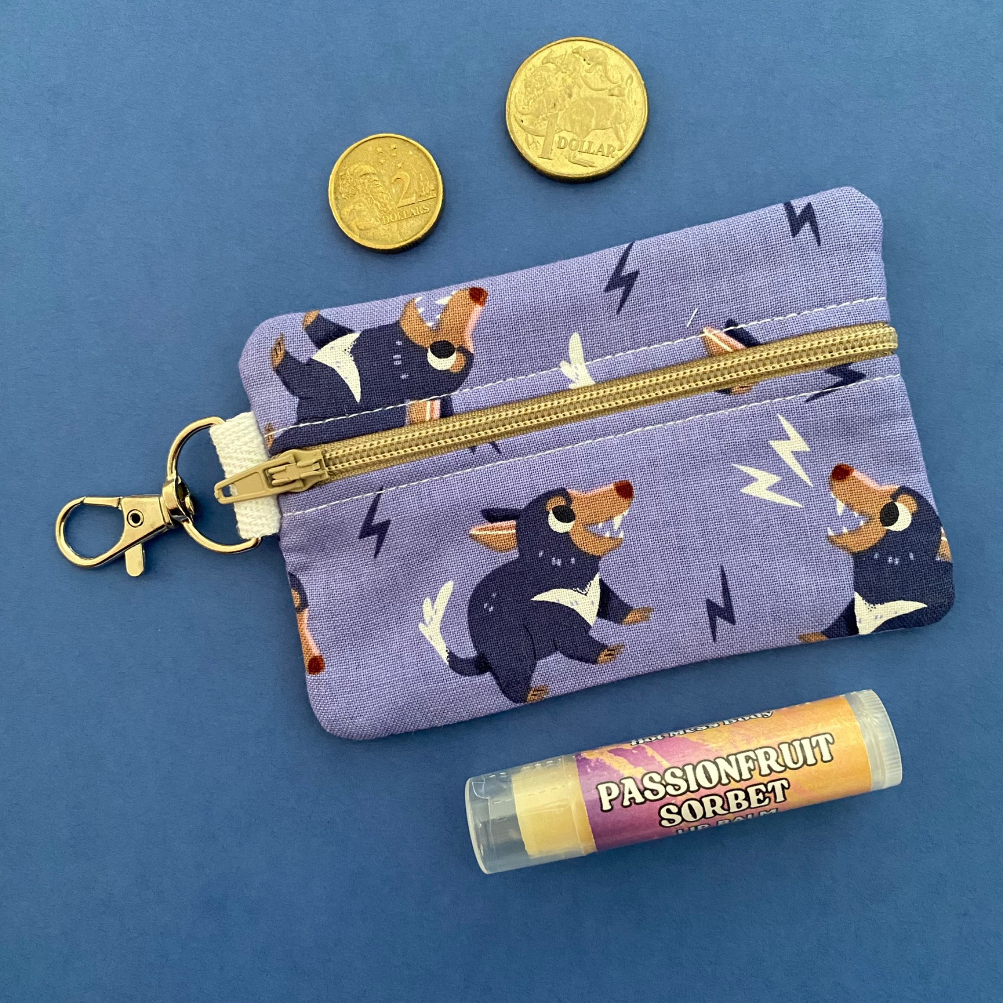 A clip coin purse featuring images of Tasmanian Devils.