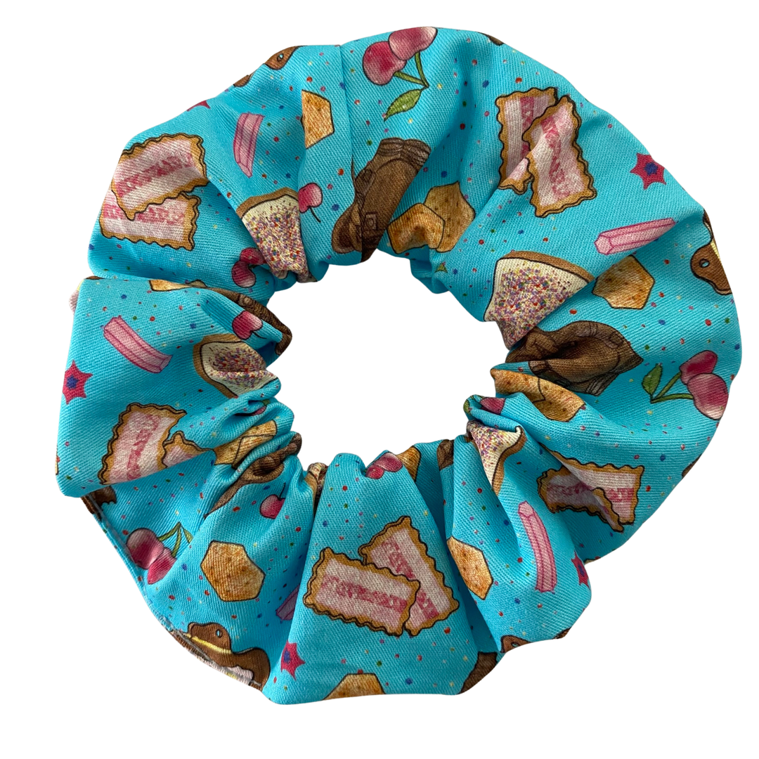 Scrunchie with Aussie snack food on a blue background.