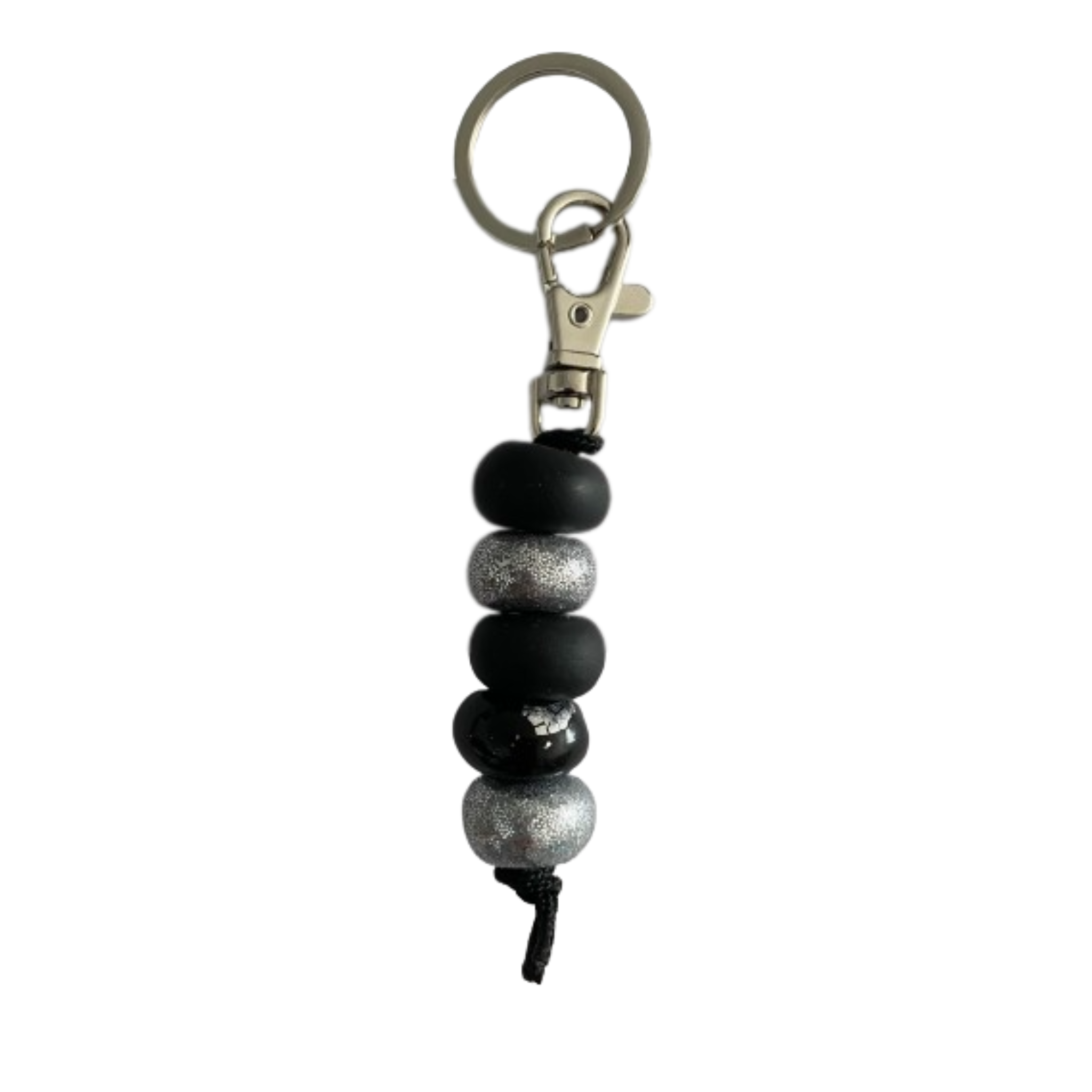 Handmade polymer clay keyring featuring five hand-rolled beads in a mix of black and silver glitter accents, attached to a silver clasp.