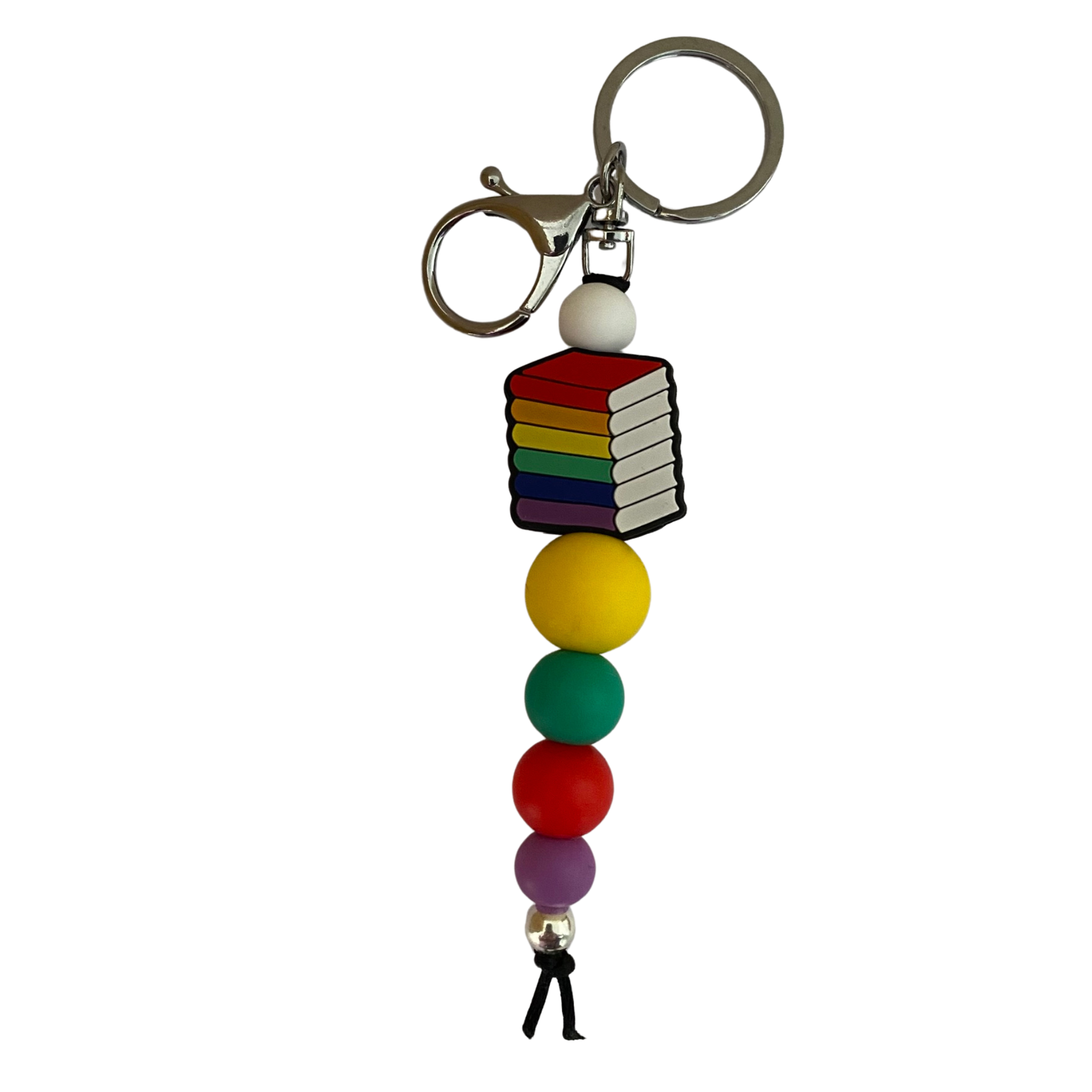 An 18cm keyring with a stack of books in the colours of the rainbow and other round coloured silicone beads.
