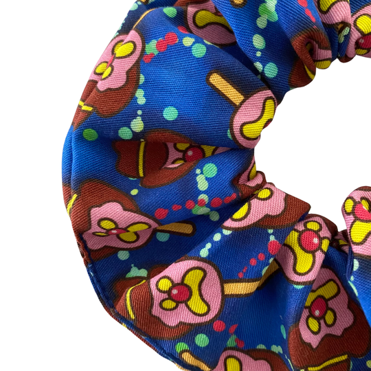 Images of Bubble O’Bill ice cream man on dark blue fabric.