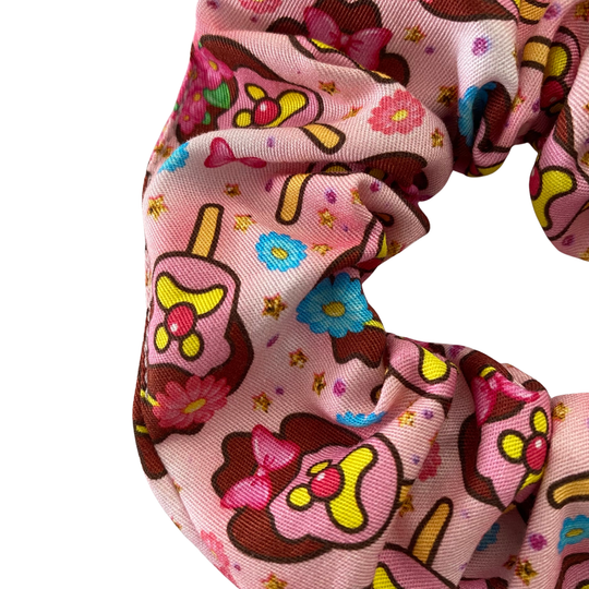 Images of Bubble O’Bill ice cream man on pink fabric.