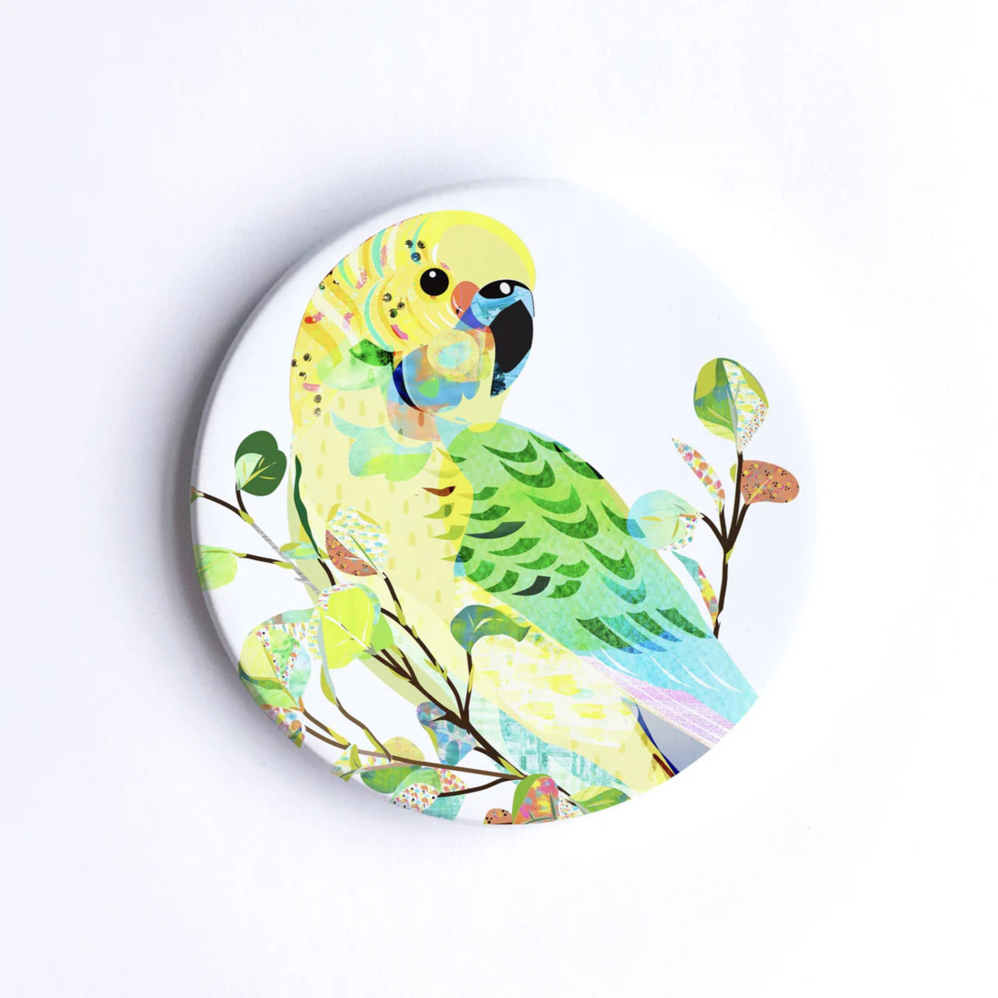 A 90mm diameter ceramic drink coaster featuring a picture of a Budgerigar.