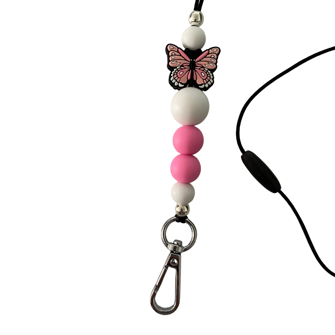 Handmade lanyard featuring soft pink and white silicone beads, a 10mm silver aluminium bead, and a pink butterfly focal charm on a durable cord.