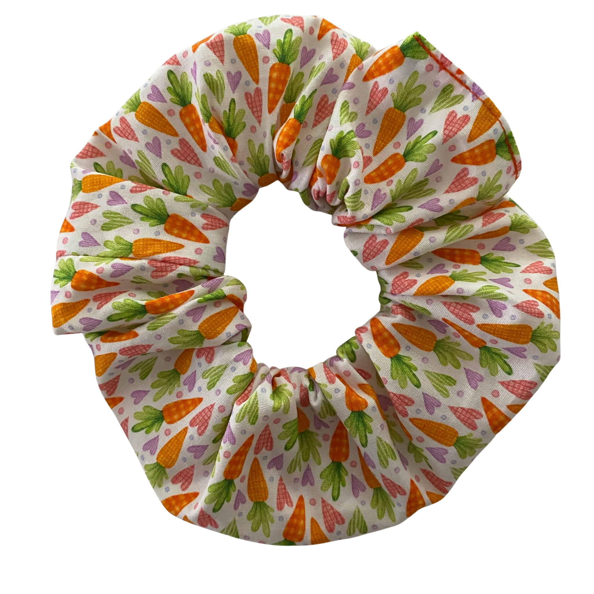 Colourful scrunchie with carrot pattern on a white background