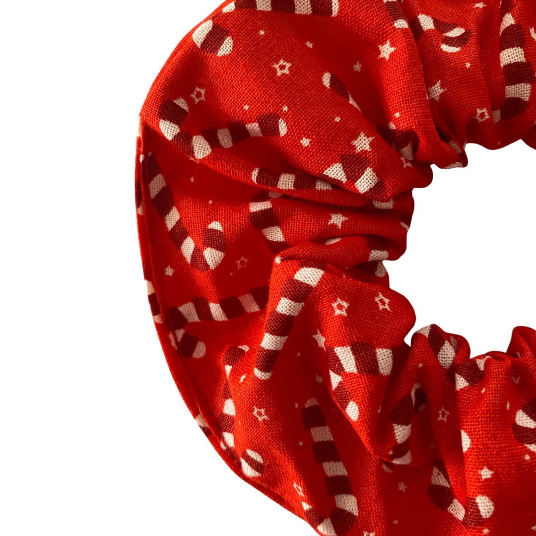 Candy cane pattern on a red scrunchie.