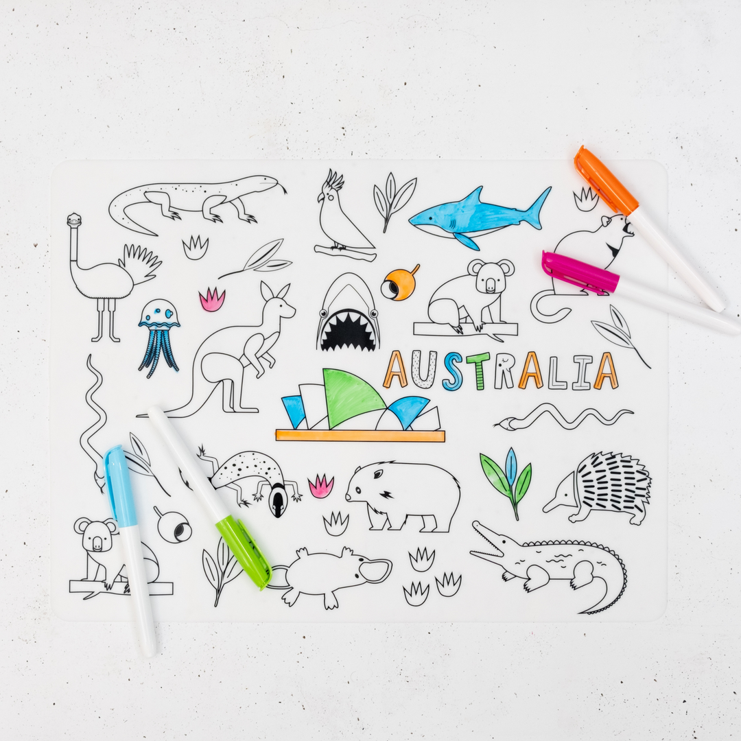 A picture of the Australia-themed Colour-In Silicone placemat showcasing iconic images of Australia including Kangaroo, Koala and Platypus and 4 nontoxic markers.