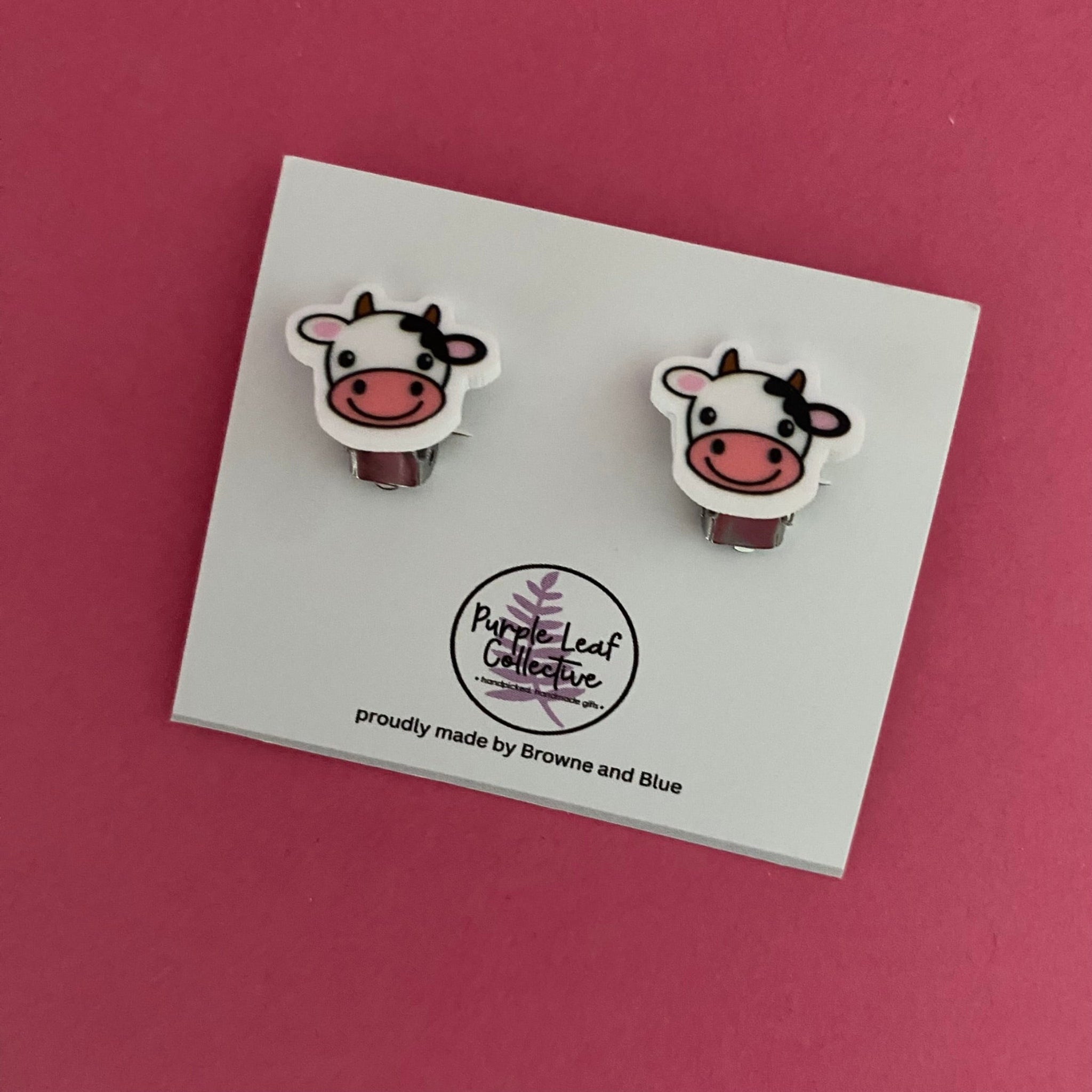 Cow Face novelty clip on stud earrings for non-pierced ears. Approx 12mm.