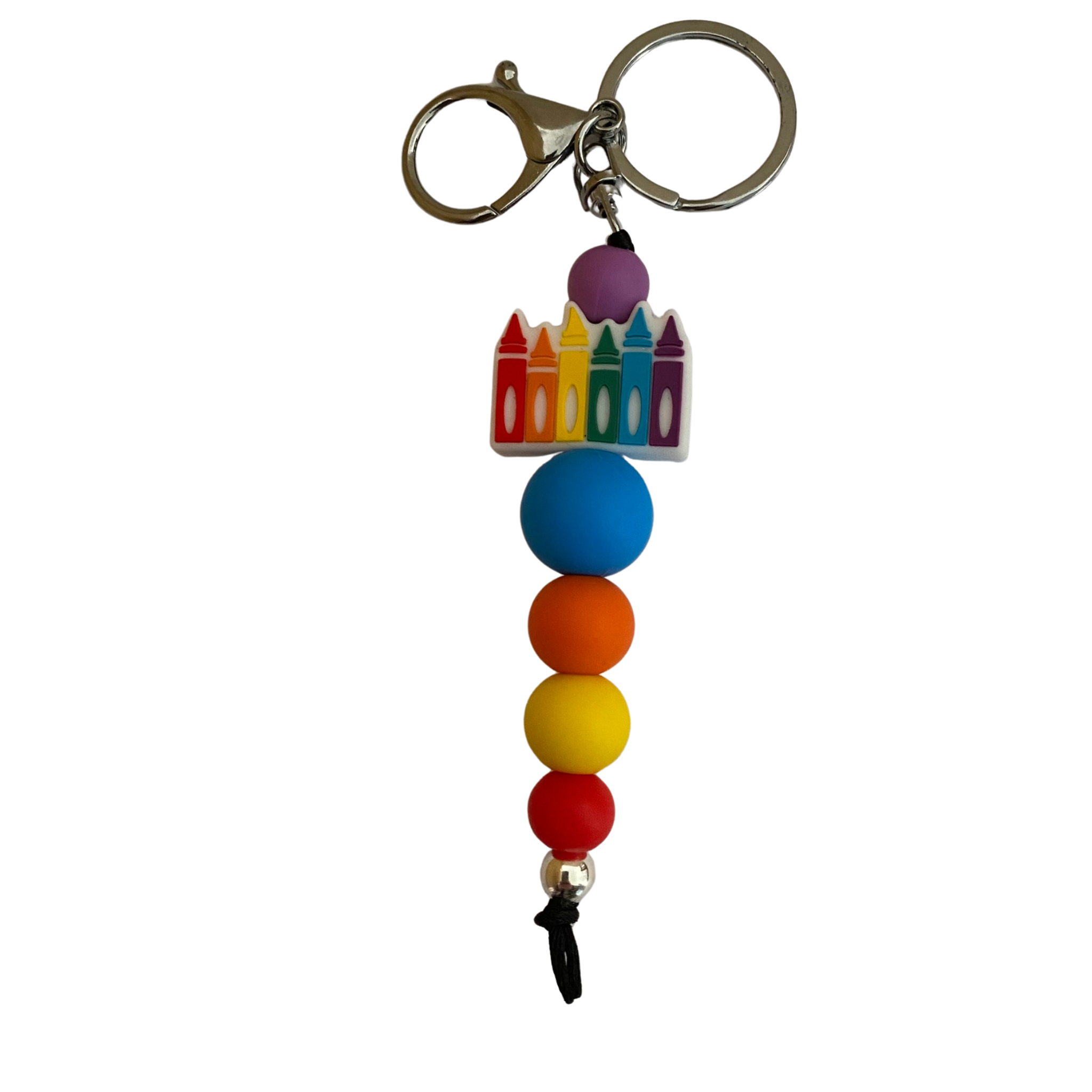 A keyring with a row 6 crayons and other round silicone beads.