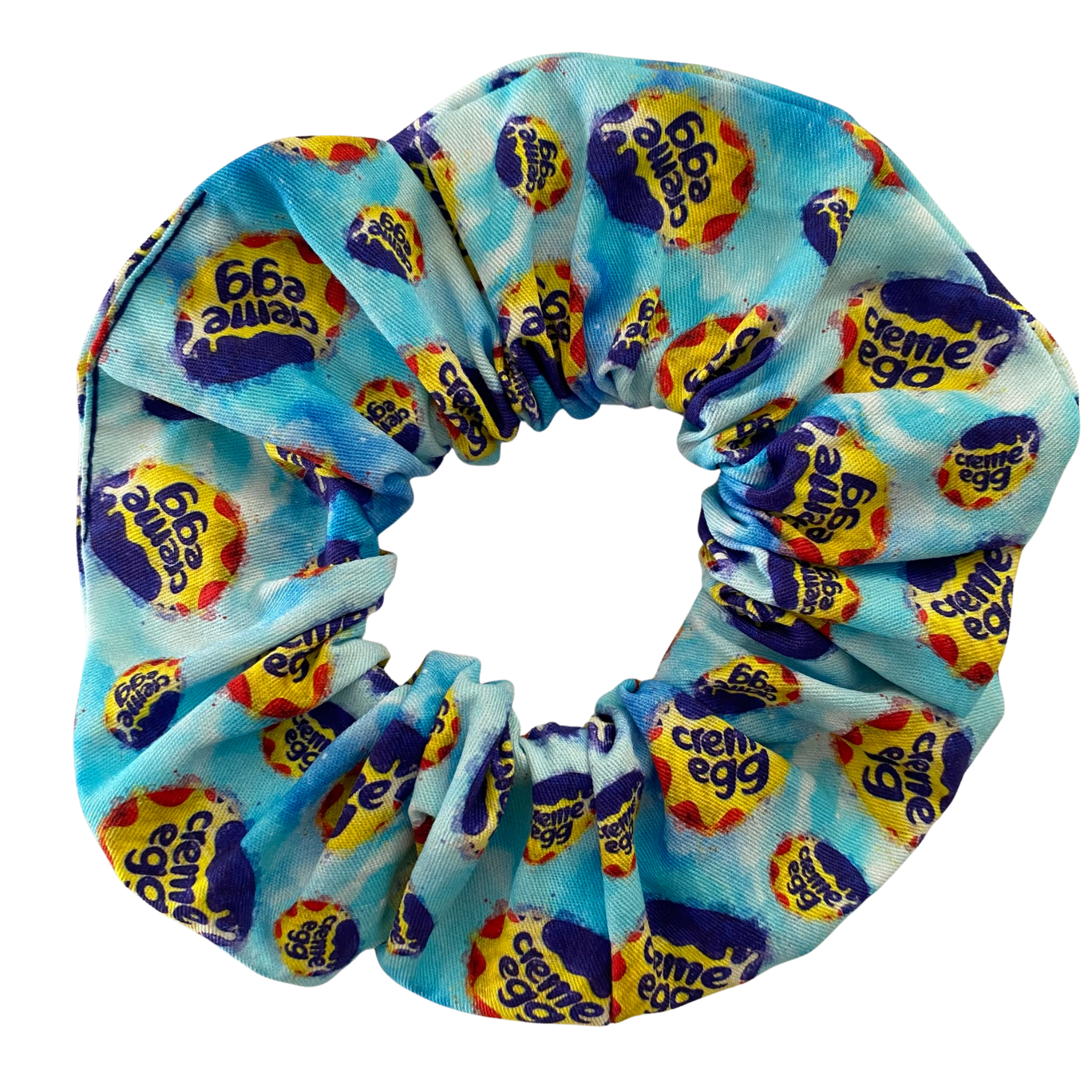 Blue Scrunchie with Cadbury Creme Egg pattern on a white background.