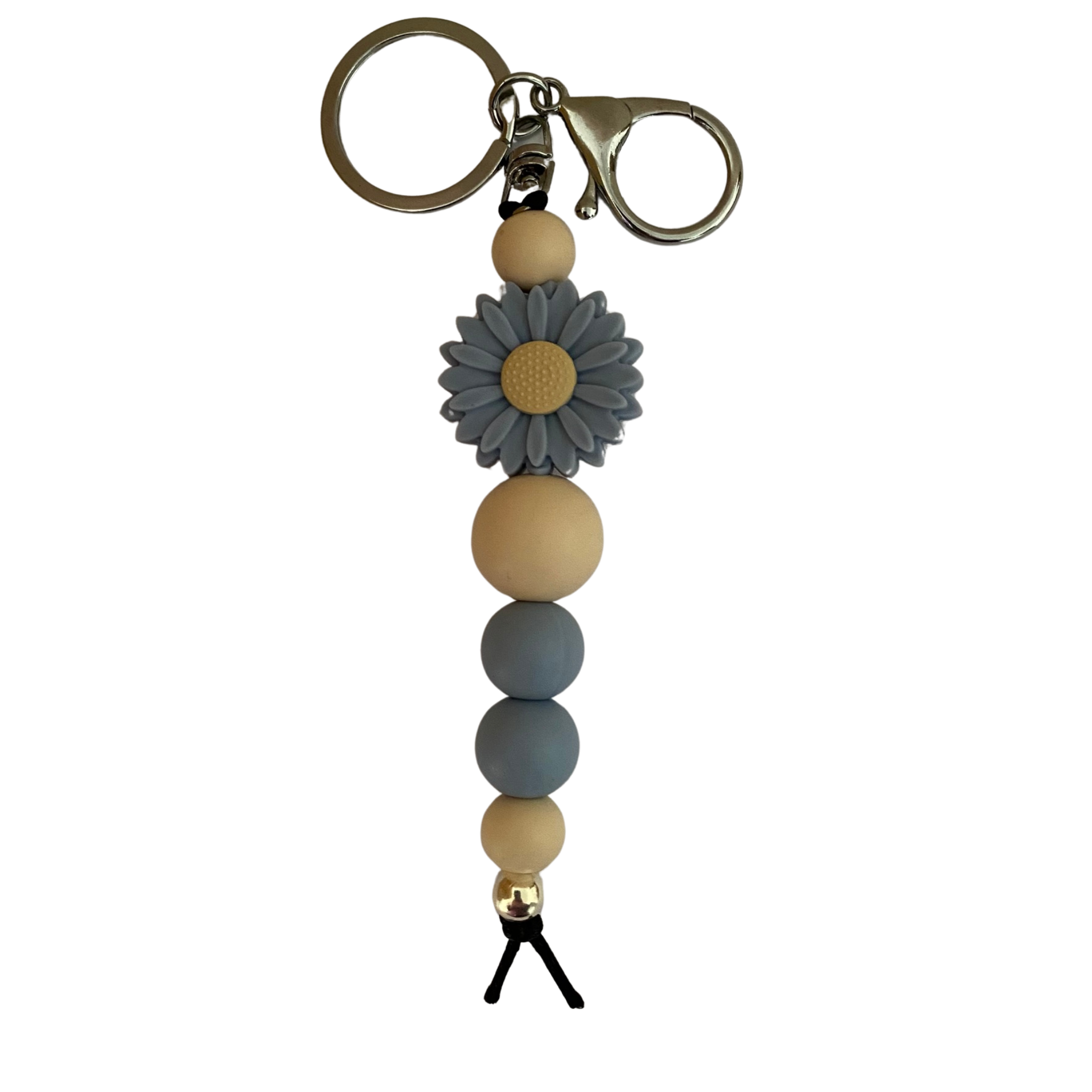 An 18cm keyring featuring a dusky blue daisy silicone bead and other round coloured silicone beads.