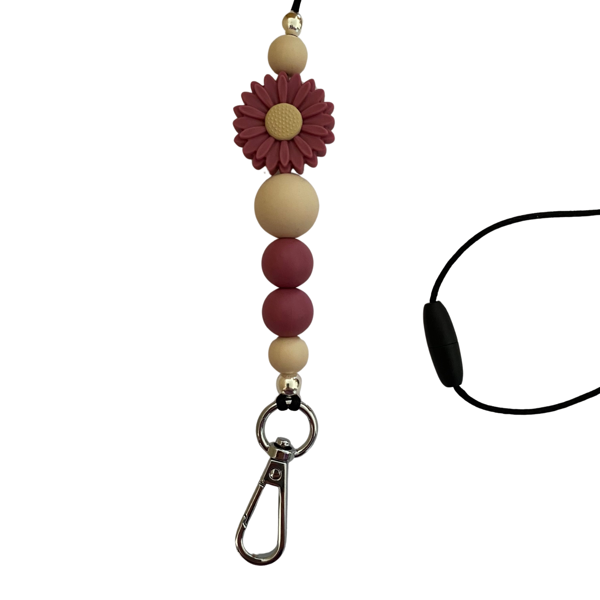 A 60cm lanyard fitted with a safety break away clasp and a Daisy Violet silicone bead and other coloured round silicone beads.