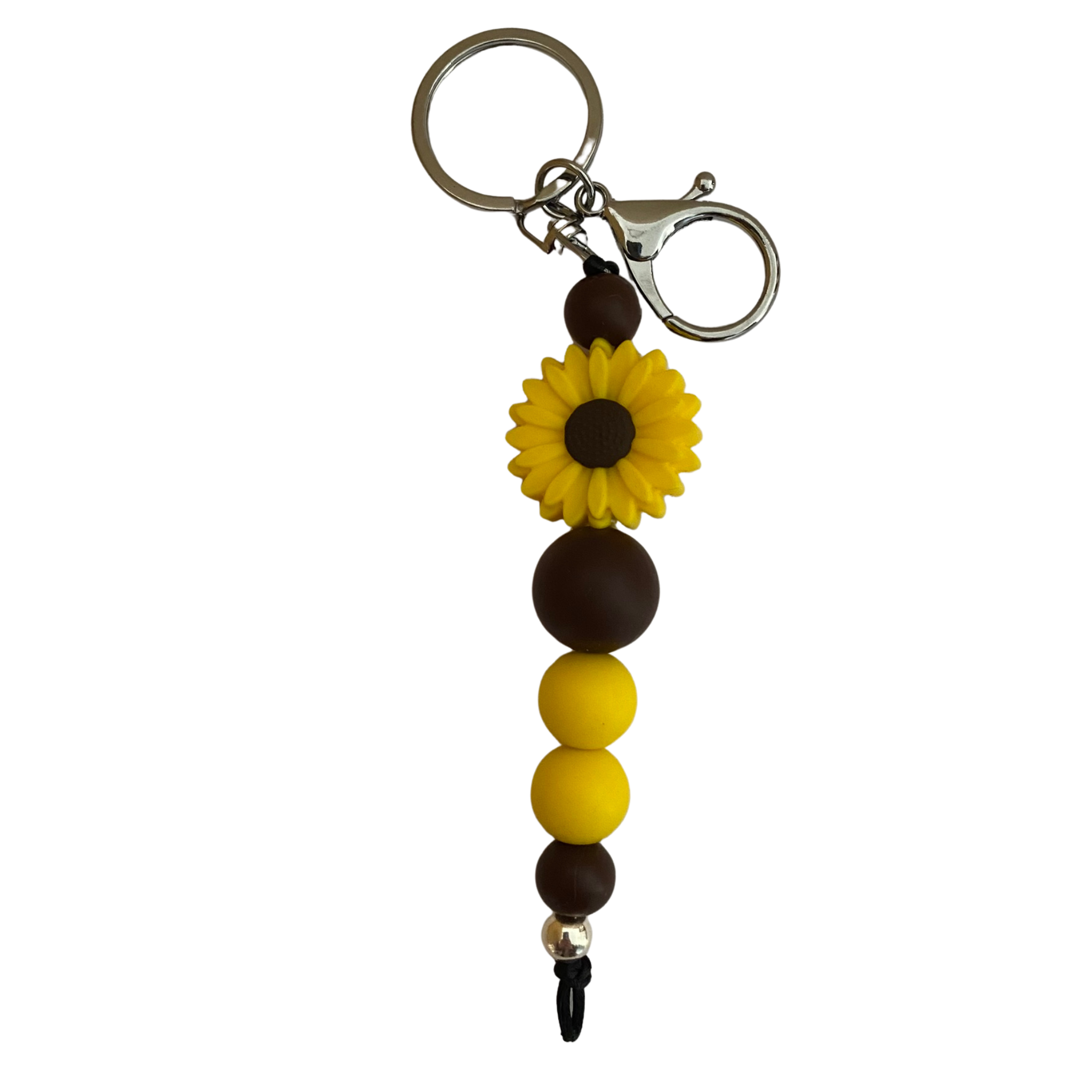 An 18cm keyring with a daisy yellow silicone bead and other colourful silicone beads.