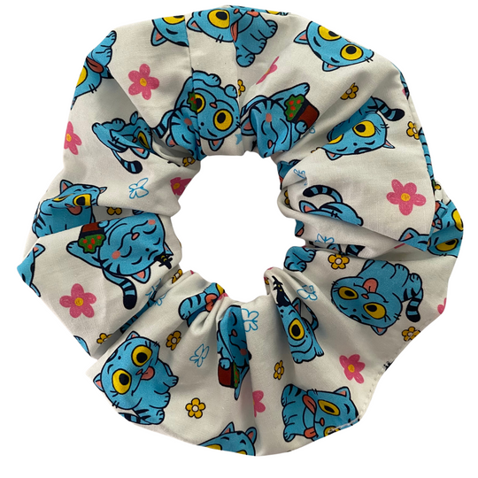 Images of Derpy Tiger from K-Pop Demon Hunters on a white scrunchie.