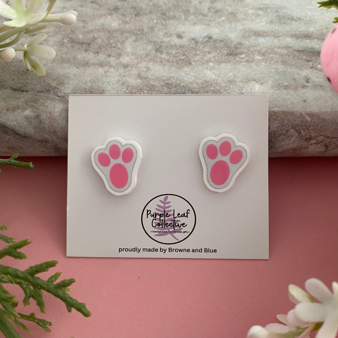 Easter bunny pink paw print stud earrings.