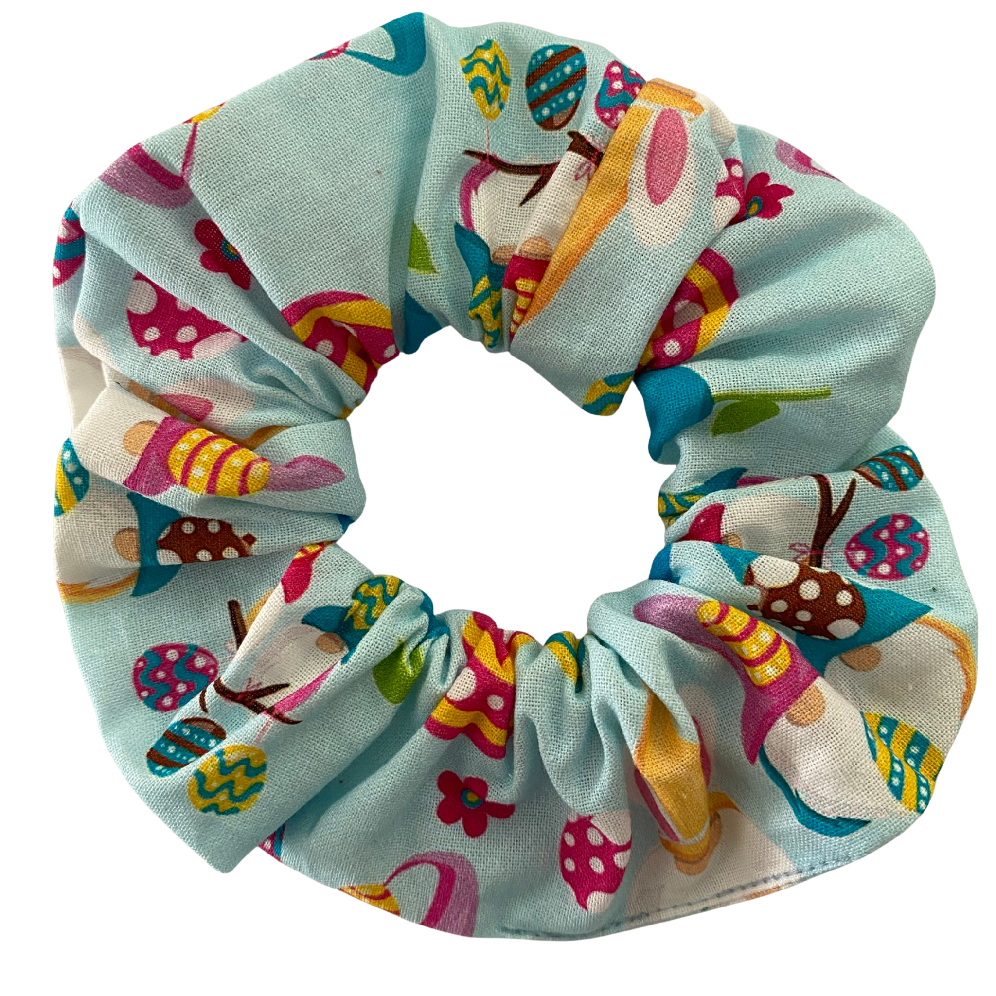 Scrunchie with images of Easter Gnomes and patterned Easter eggs on a blue fabric.