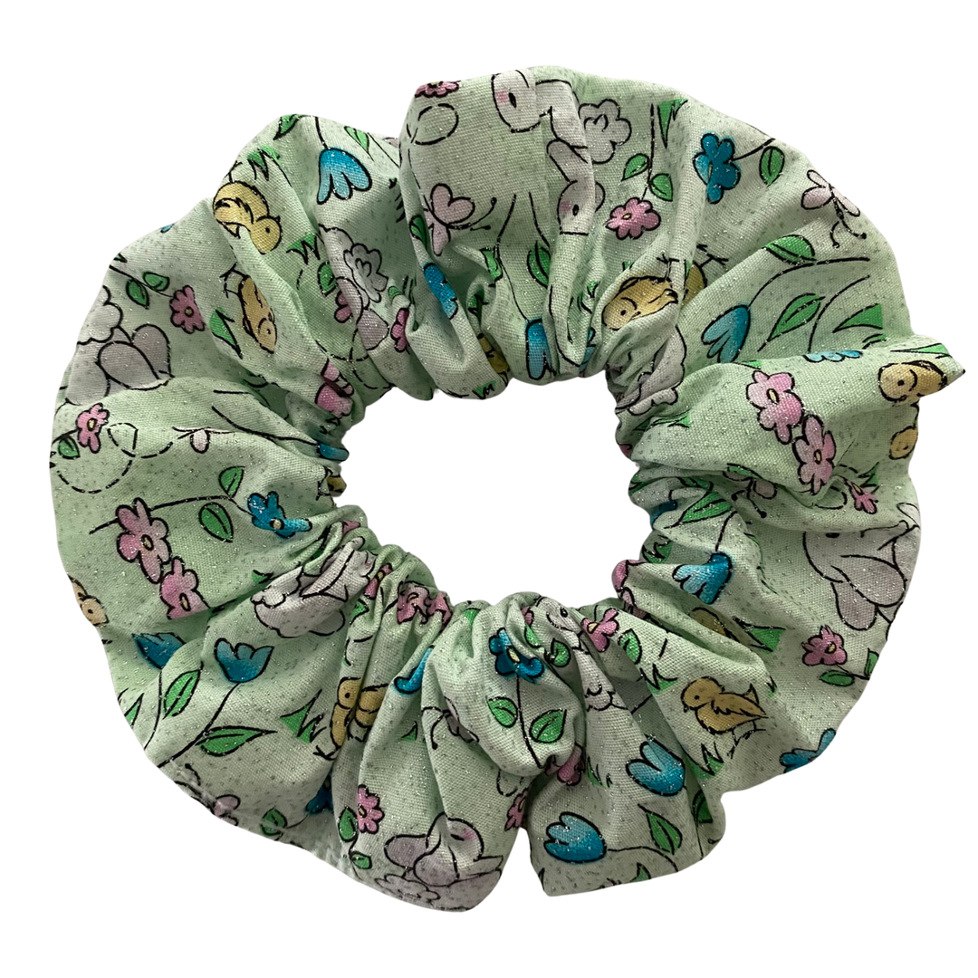 Bunny floral patterned scrunchie on a white background.