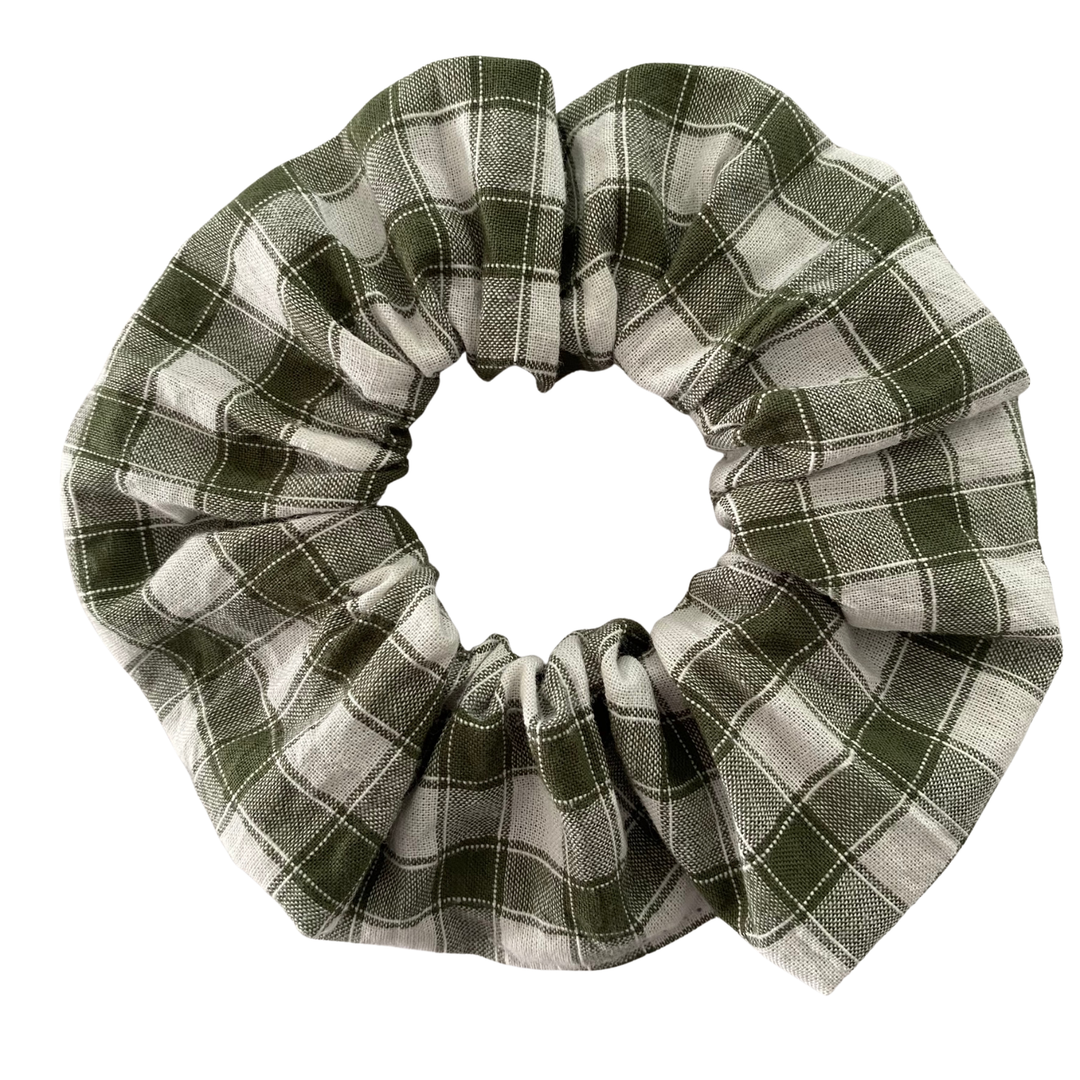 Forest green checkered scrunchie on a white background.