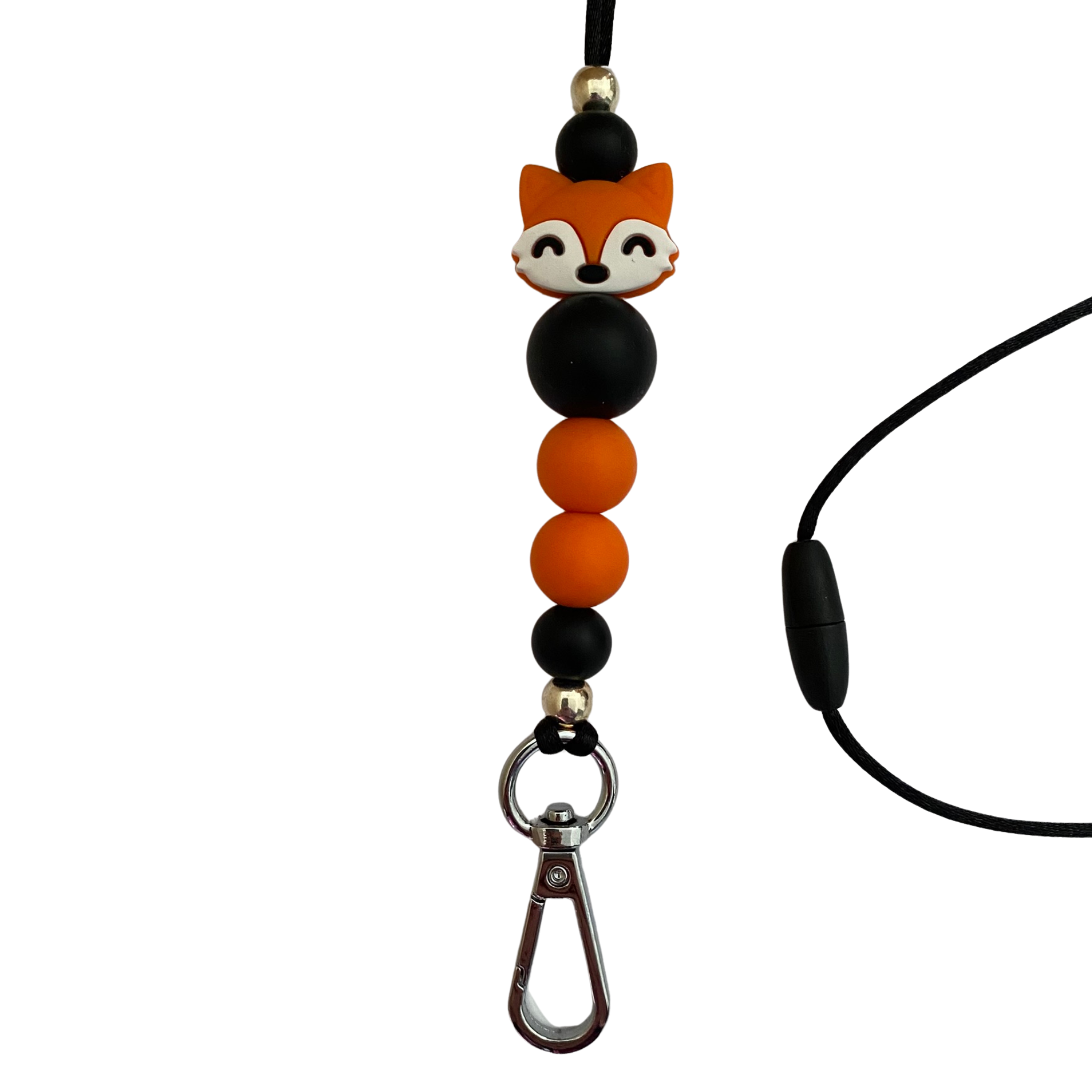 A 60cm lanyard fitted with a safety break away clasp featuring a fox face silicone bead and other coloured round silicone beads.