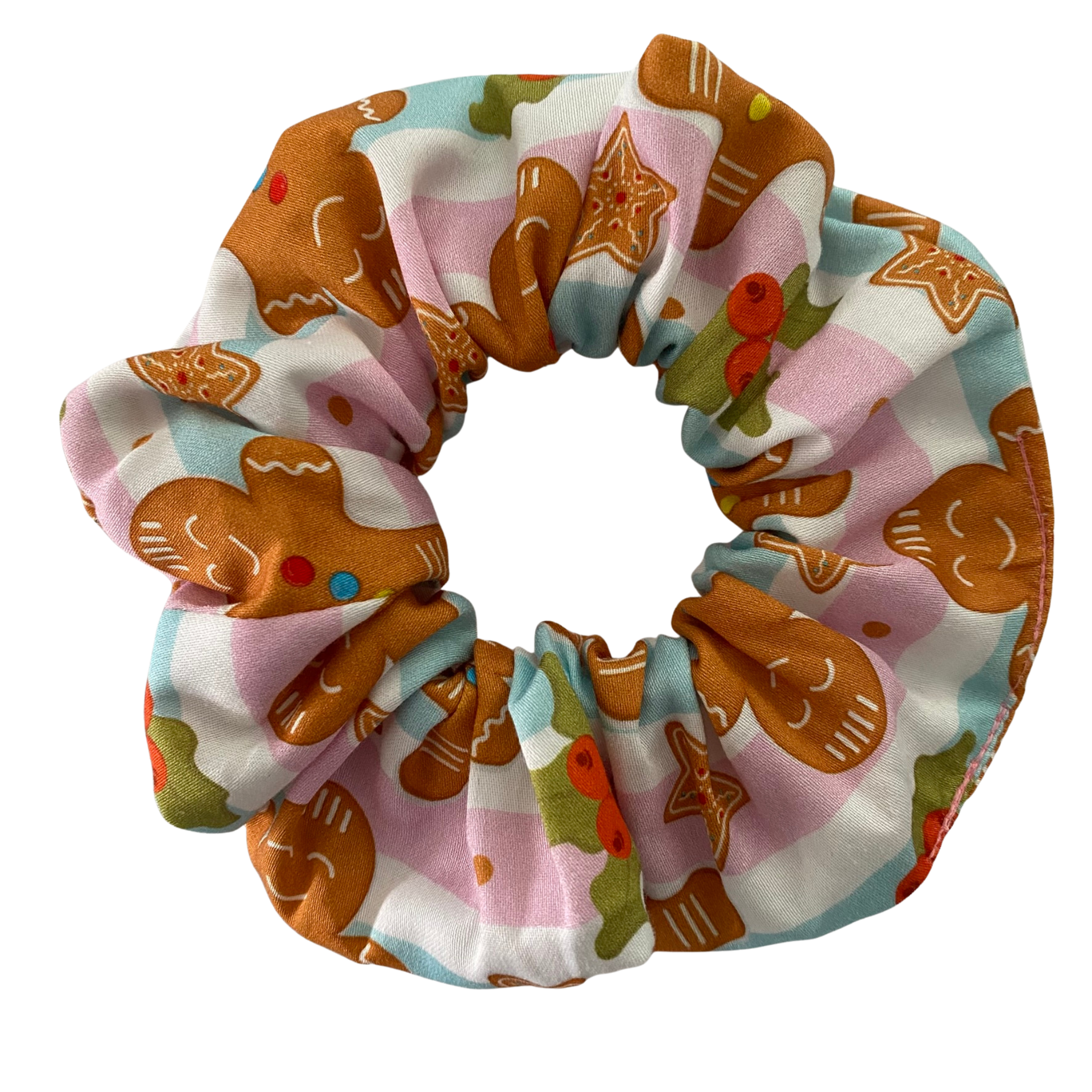 Scrunchie with gingerbread man pattern on a white background.
