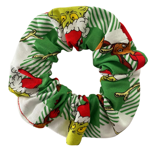 Scrunchie with Grinch character pattern on a green check fabric.
