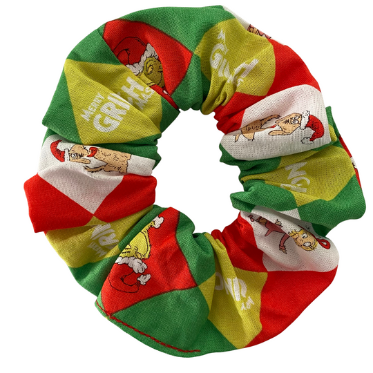 Colourful scrunchie with Grinch character design on a white background.