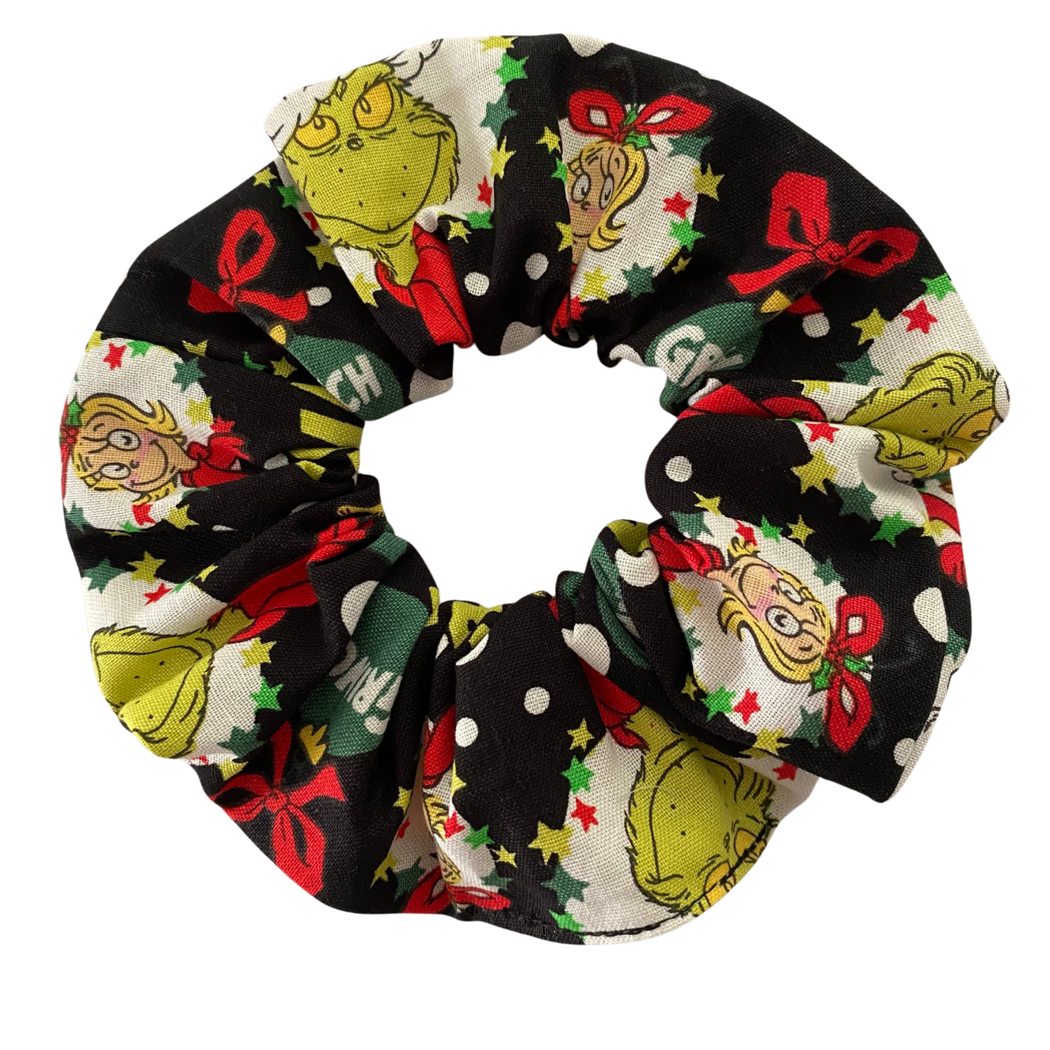 Scrunchie with festive Grinch design on a white background.