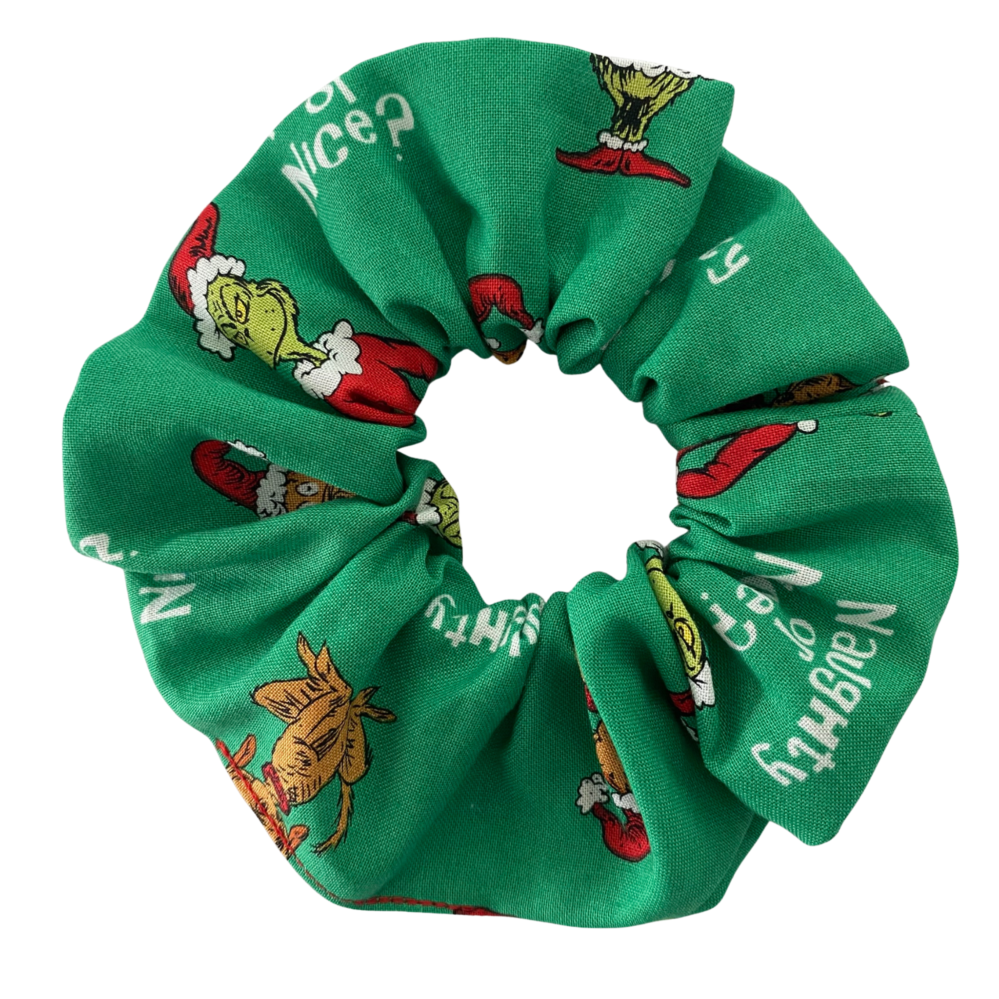 Green scrunchie with Grinch character print on a white background.