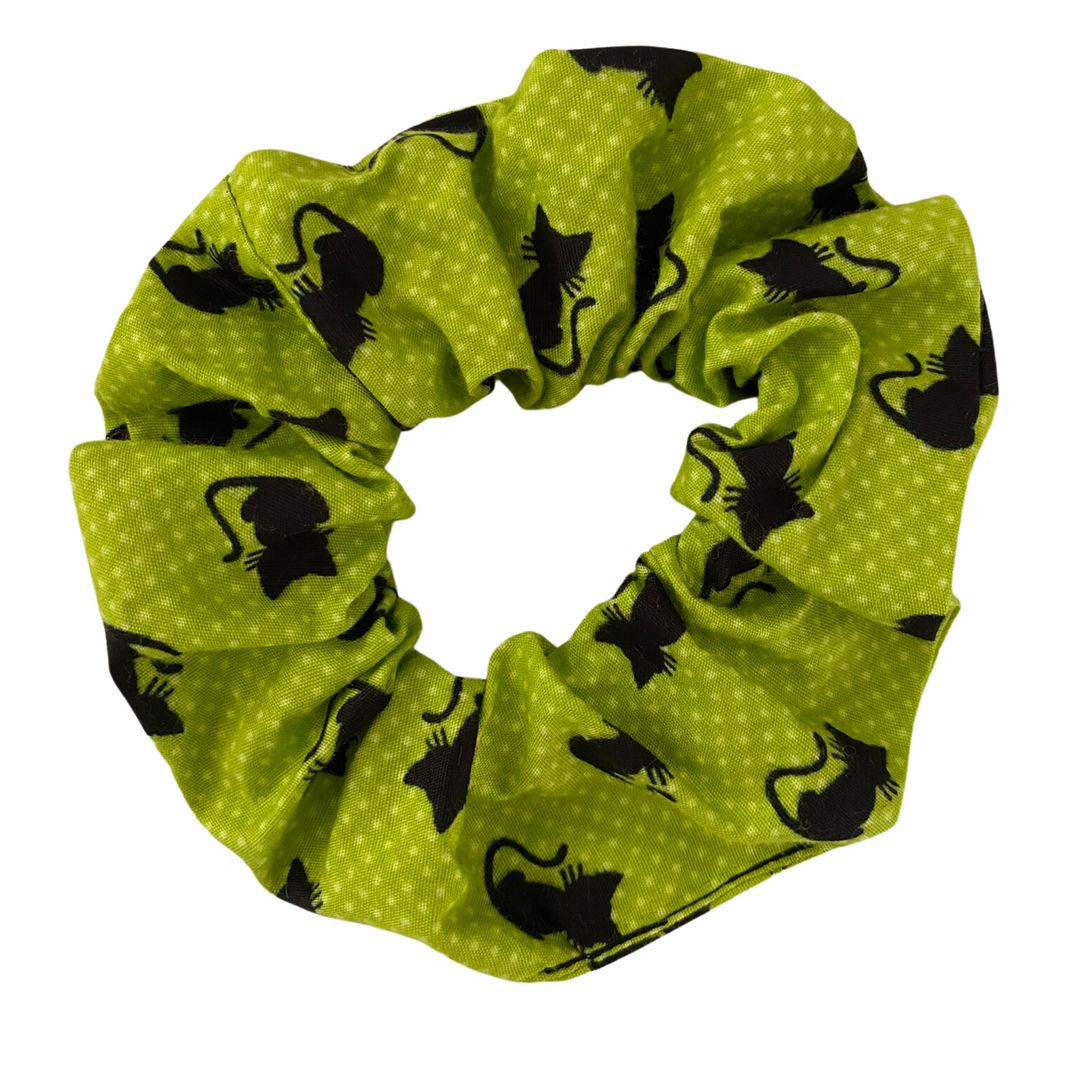 Halloween Scrunchie featuring black cats on green soft cotton woven fabric.