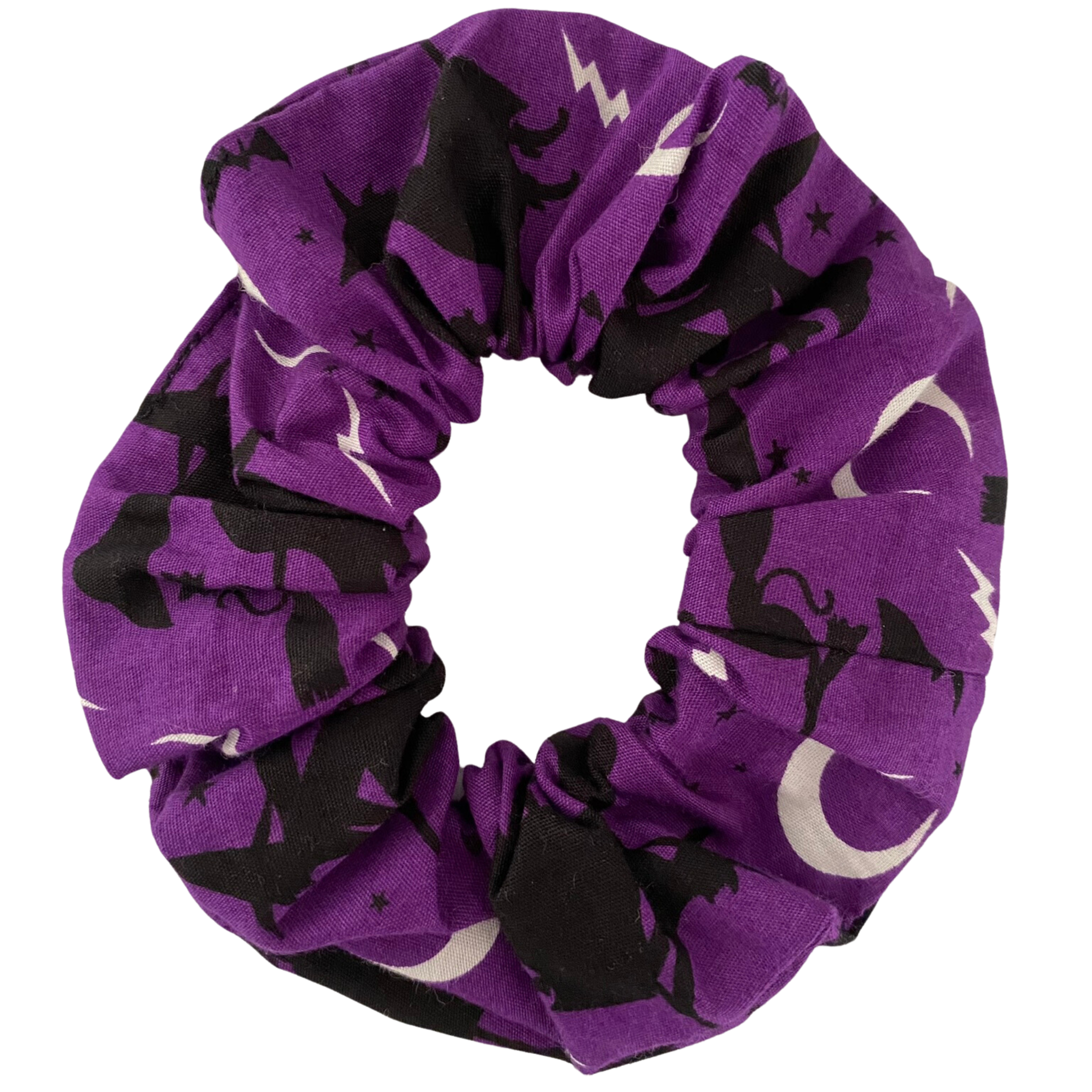 Halloween Scrunchie featuring black witches riding broomsticks on purple soft cotton woven fabric.