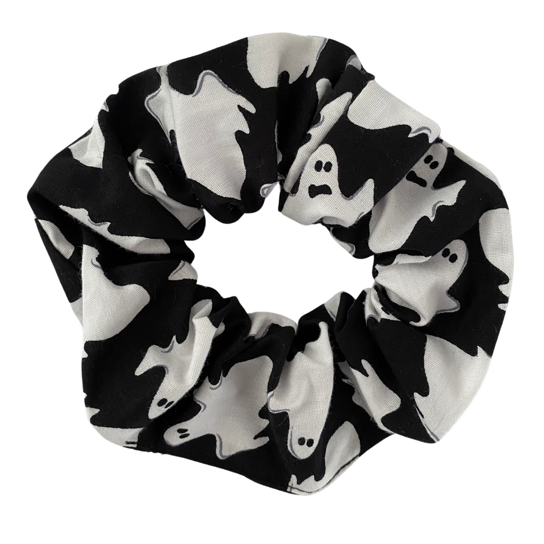 Halloween ghosts scrunchie featuring playful white ghosts on black soft cotton woven fabric.