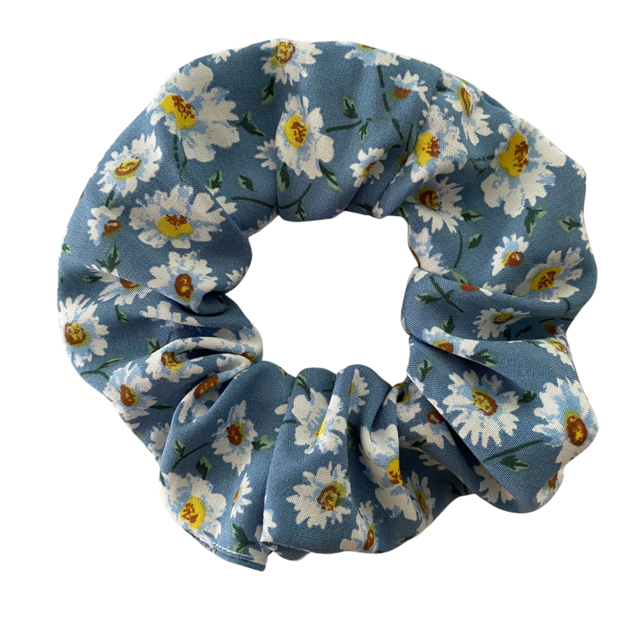 A soft rayon scrunchie with white daisies on a rich blue fabric.