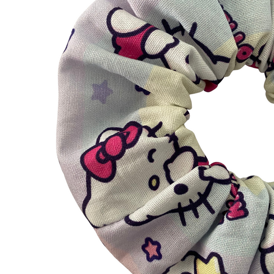 Hello Kitty-themed scrunchie on a white background.