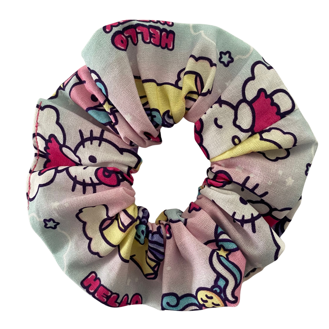 Hello Kitty-themed scrunchie on a white background.