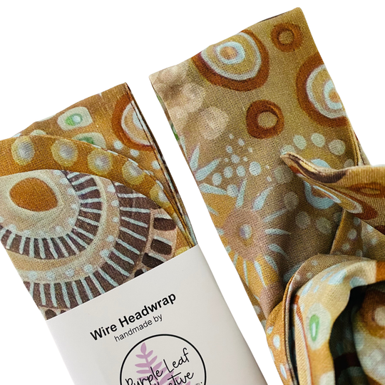 Close up view of Coastal Land Wire Headwrap by Holly Sanders. Handmade woven cotton headwrap featuring contemporary Aboriginal art inspired by the connection between land and sea.