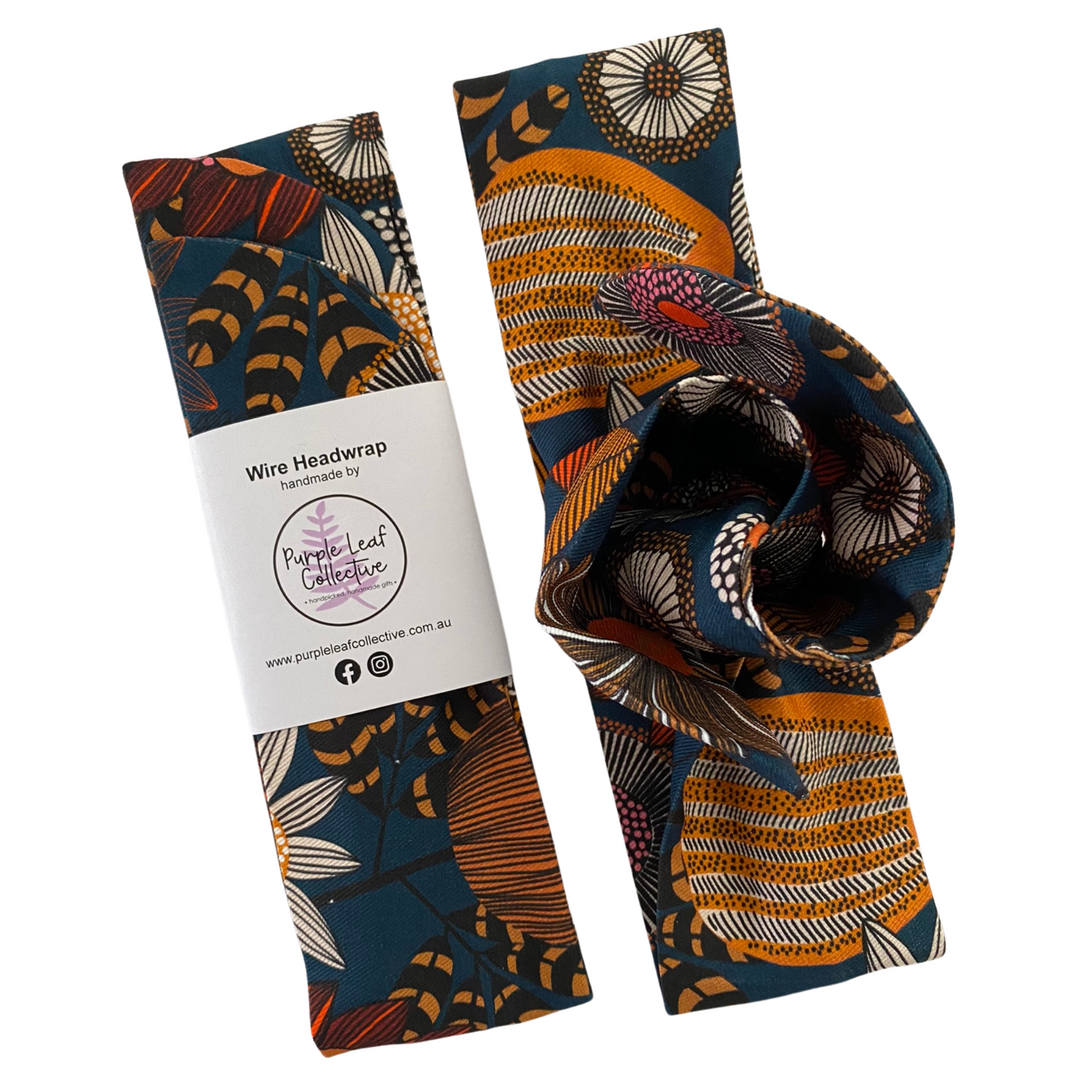 Wire headwrap with decorative banksia pattern and packaging on a white background.