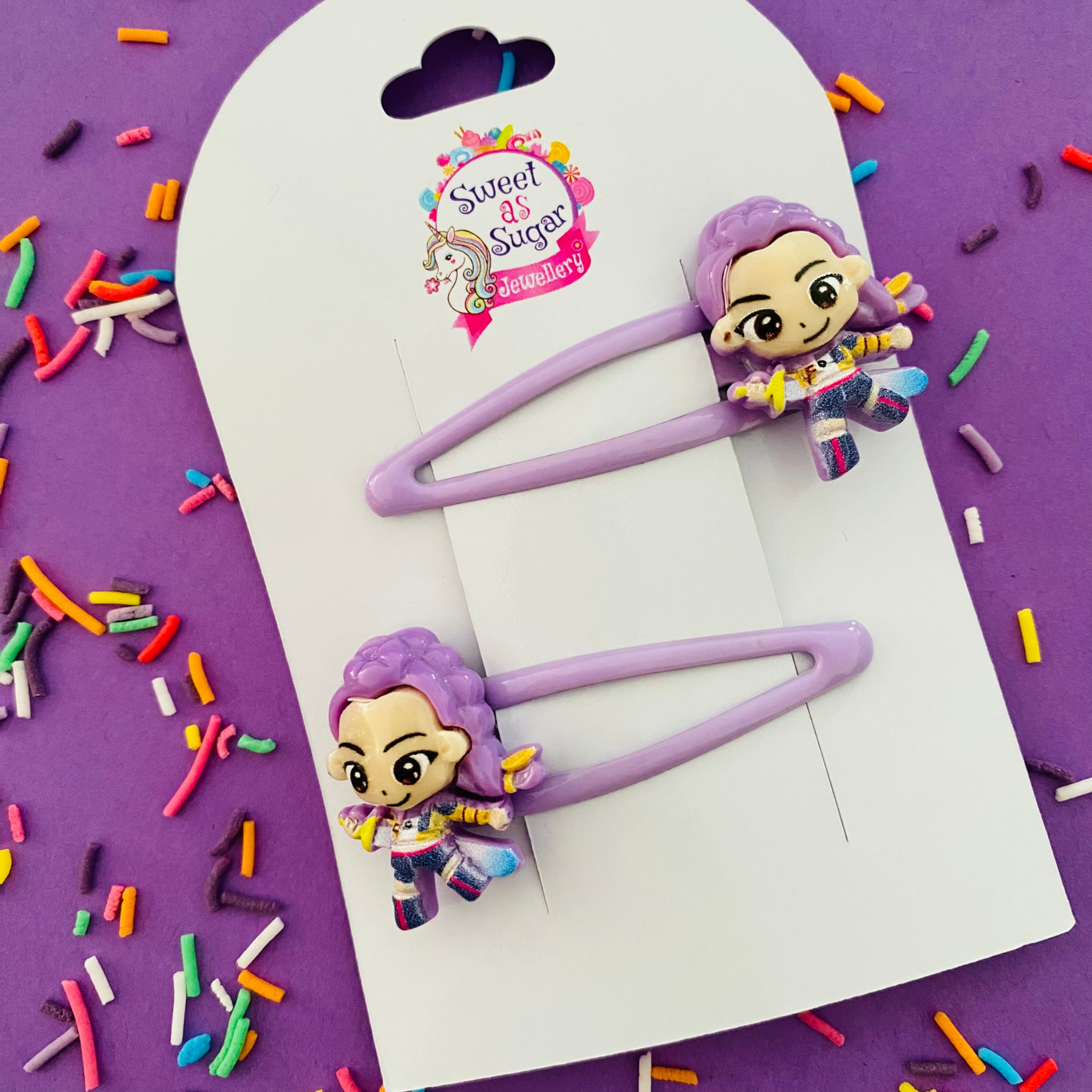 Purple hair clips with K-Pop Zoey charmcharacter design.