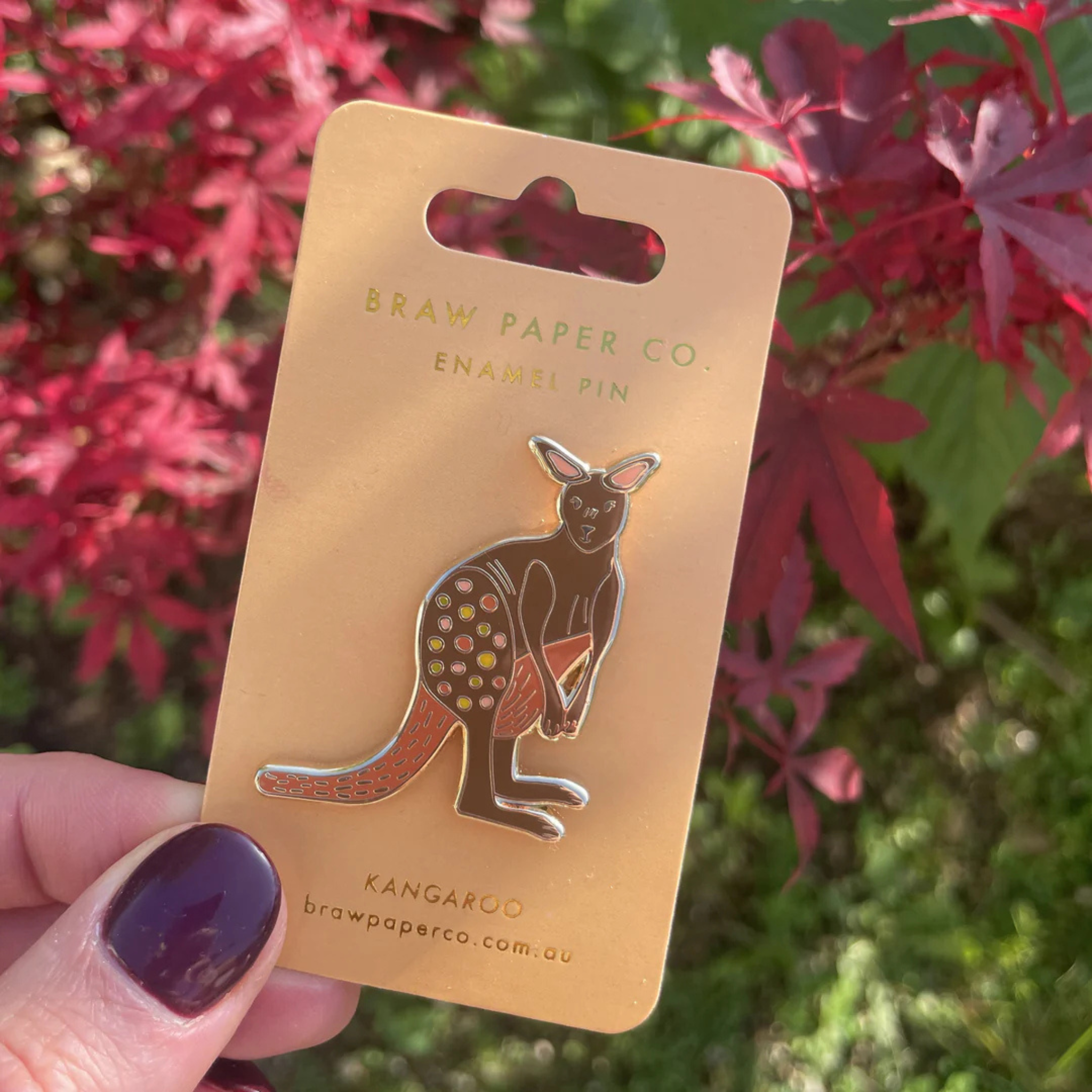 Our Kangaroo Enamel Pin featuring a warm, earthy colour palette inspired by the Australian Outback.