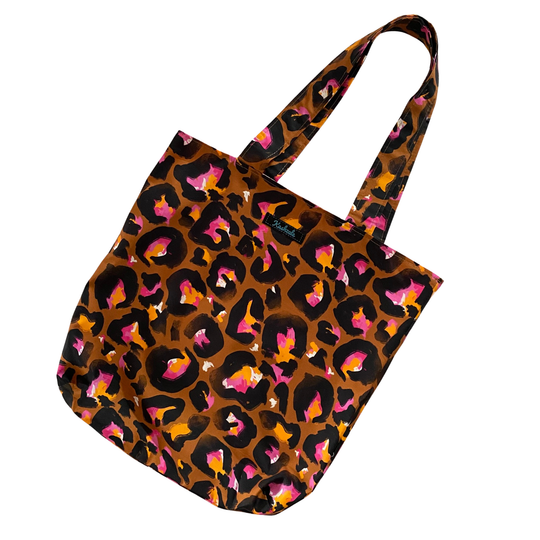Bronze Leopard print tote bag on a white background.