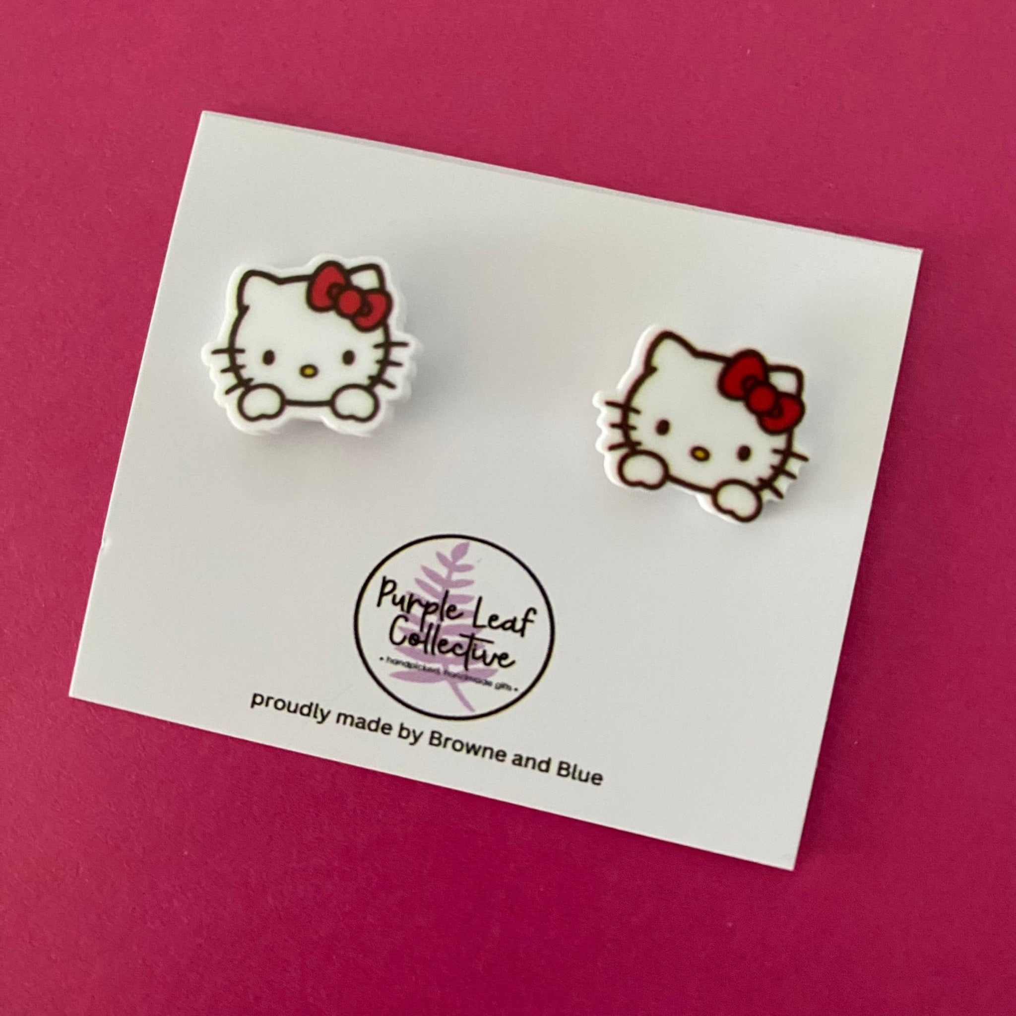 Hello Kitty novelty stud earrings. Hypoallergic Surgical Steel Posts. Printed Acrylic. Approx 15mm.